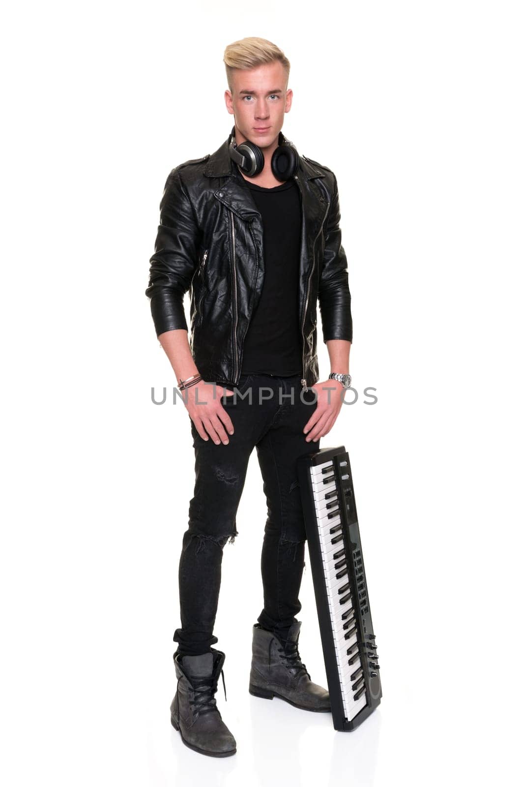 Full length shot of a disc jockey against a white background