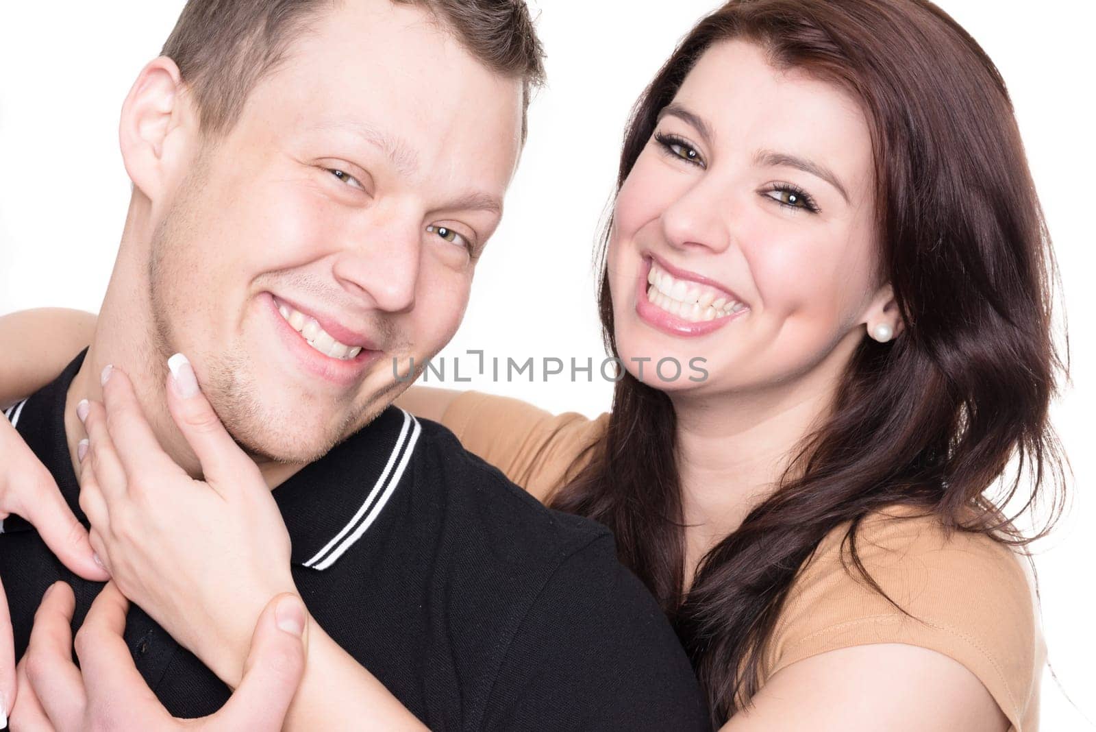 Studio shot of a young couple against a white background