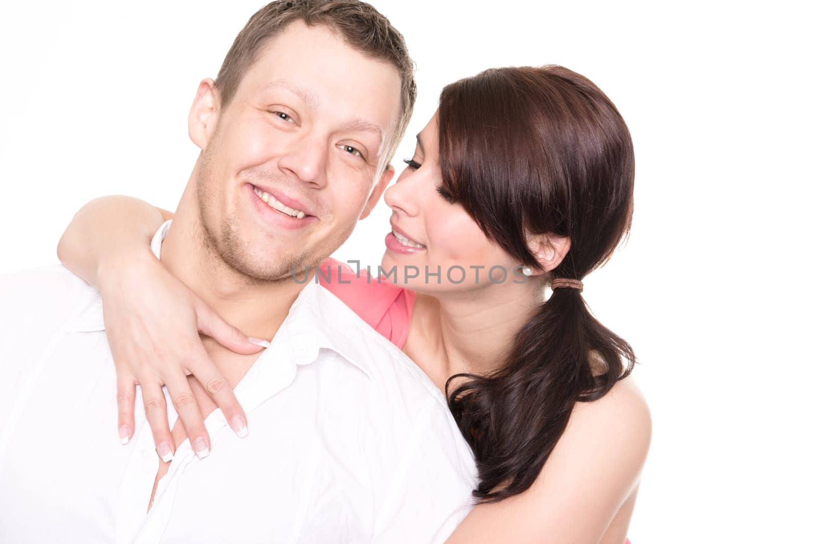 Studio shot of a young couple against a white background