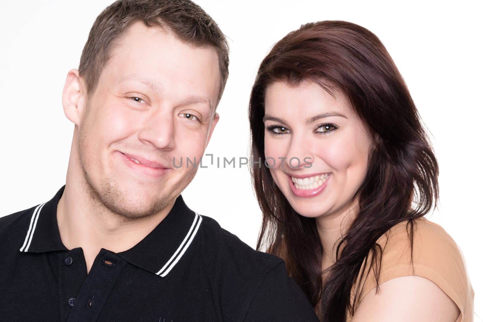 Studio shot of a young couple against a white background