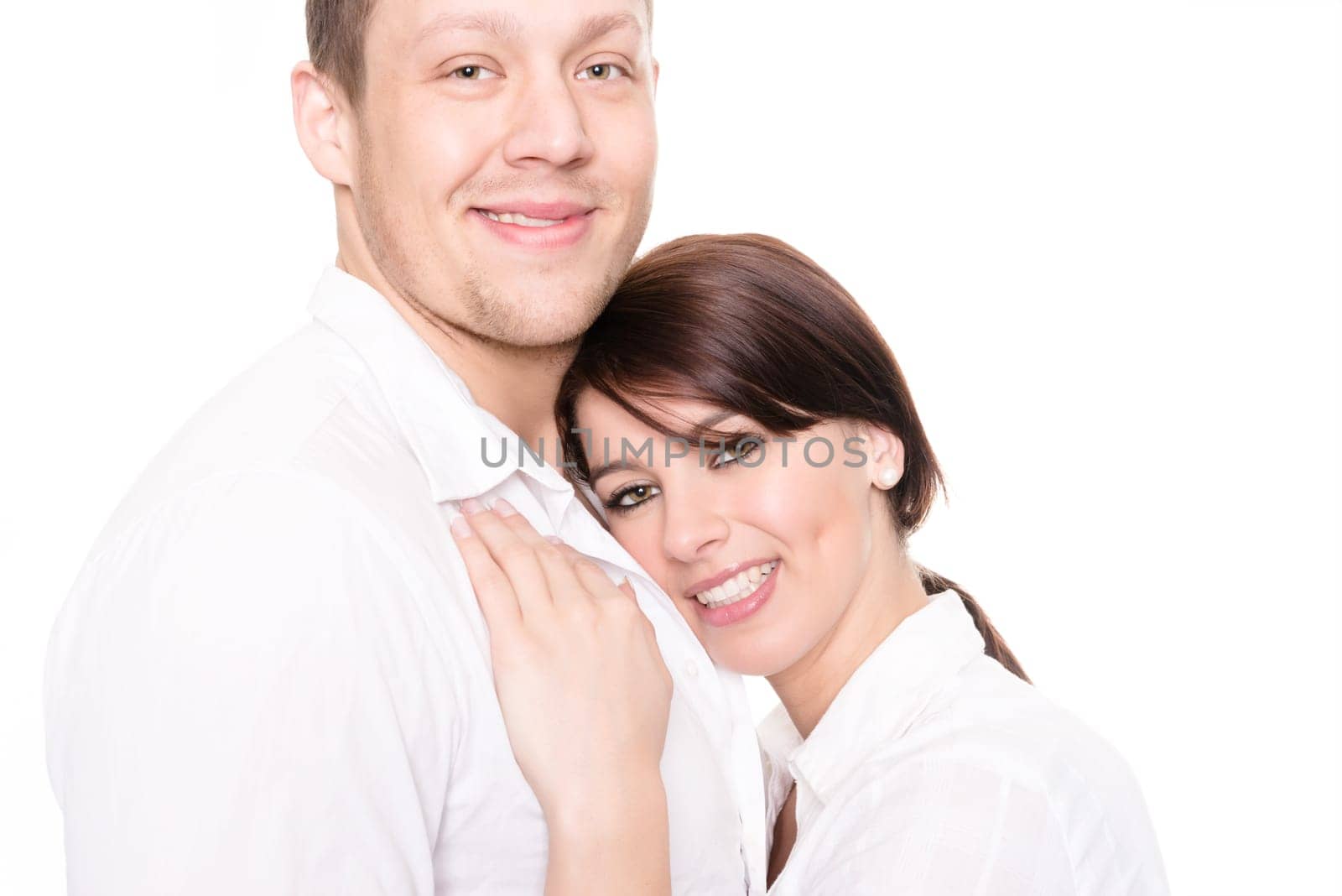 Studio shot of a young couple against a white background