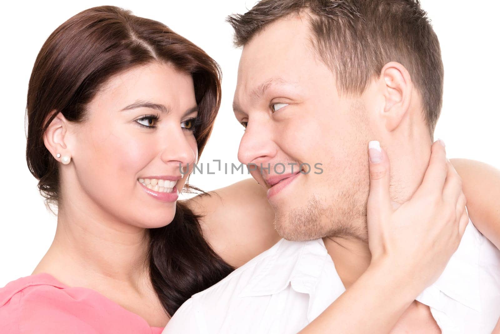 Studio shot of a young couple against a white background