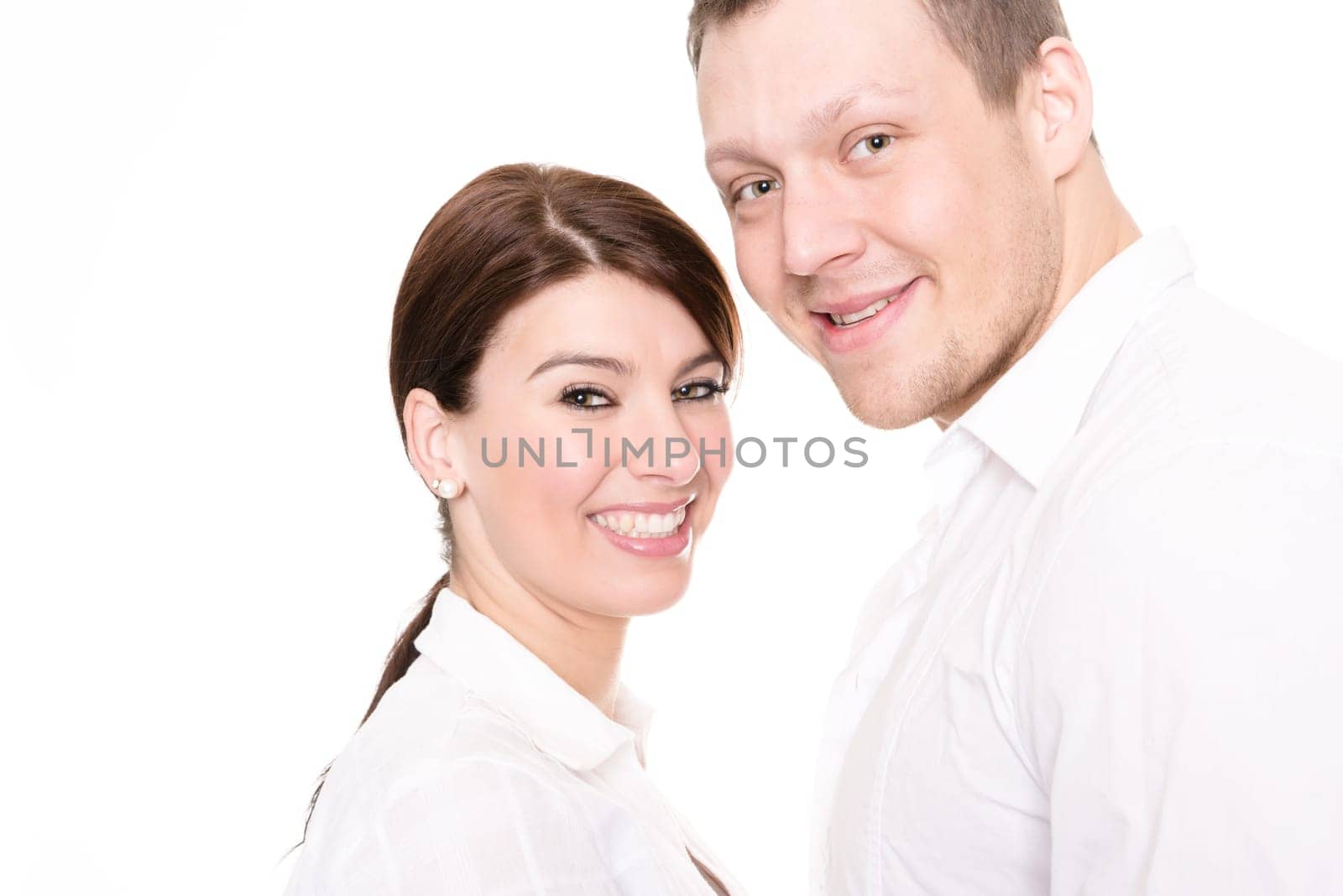 Studio shot of a young couple against a white background