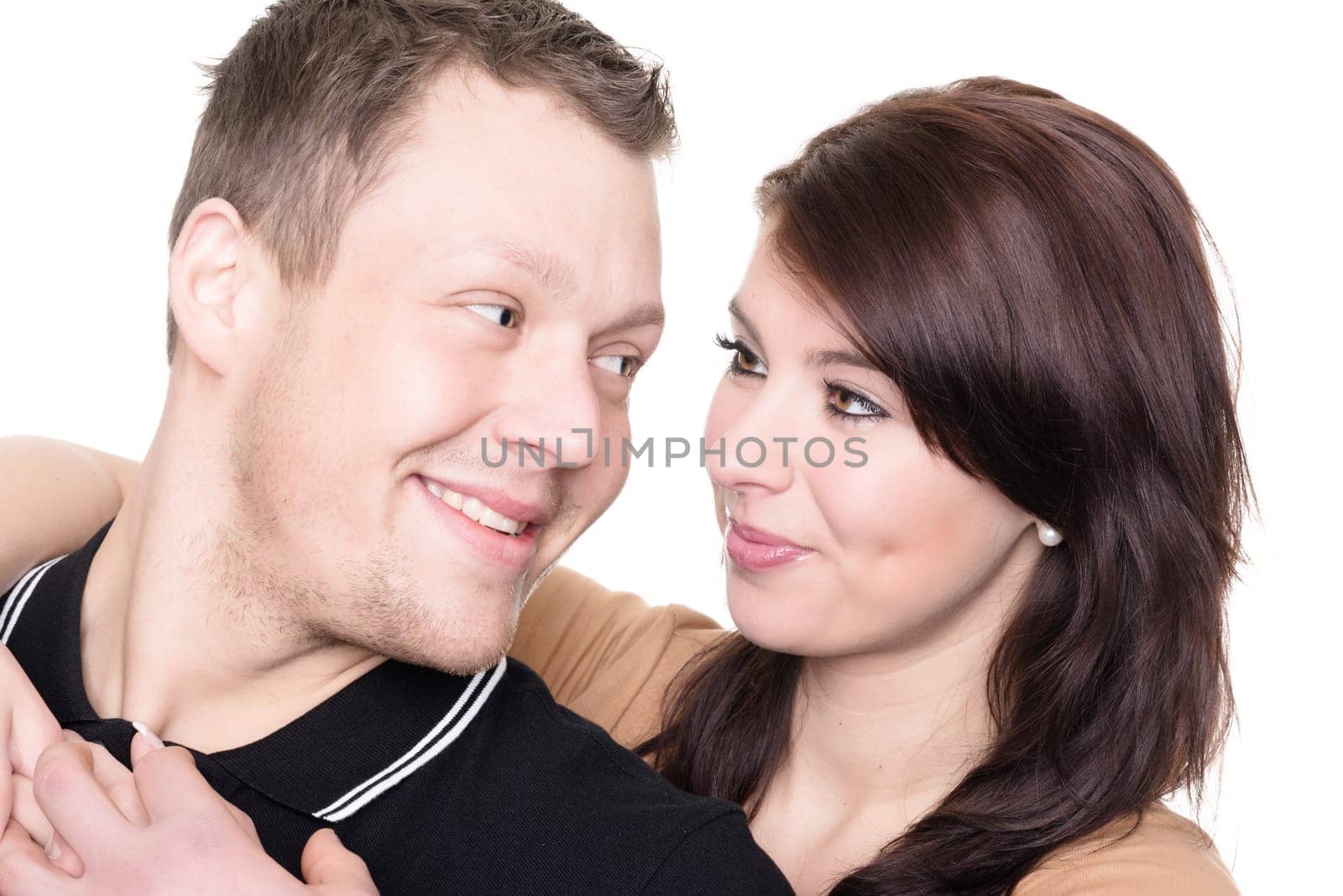 Studio shot of a young couple against a white background