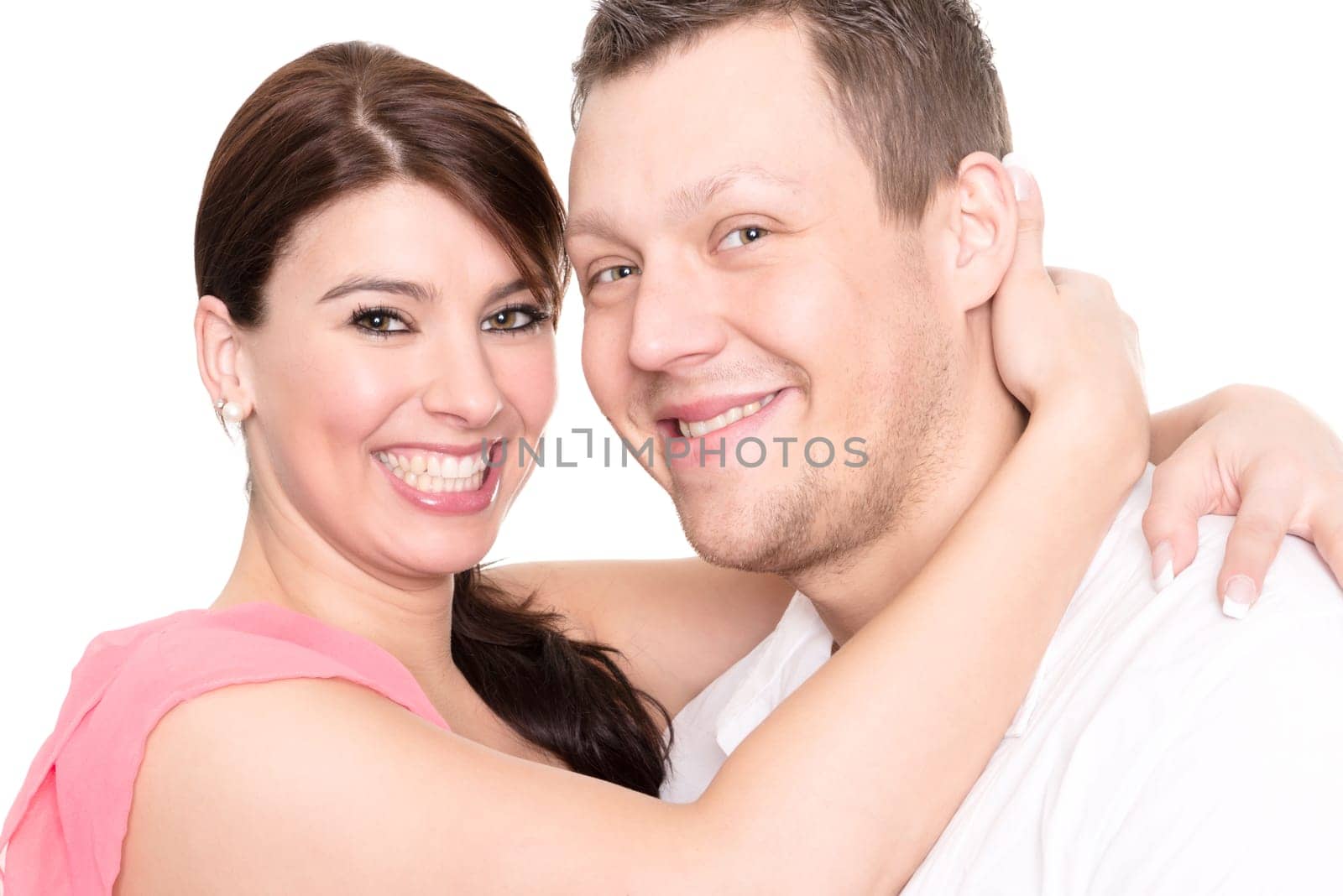 Studio shot of a young couple against a white background