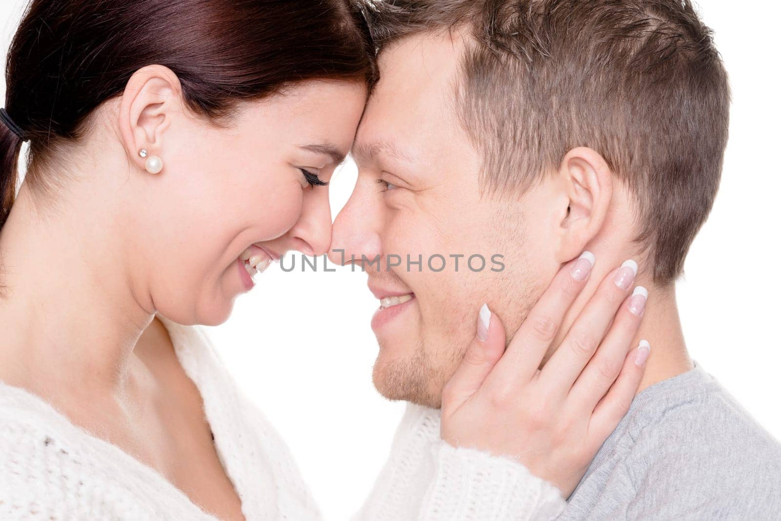 Studio shot of a young couple against a white background