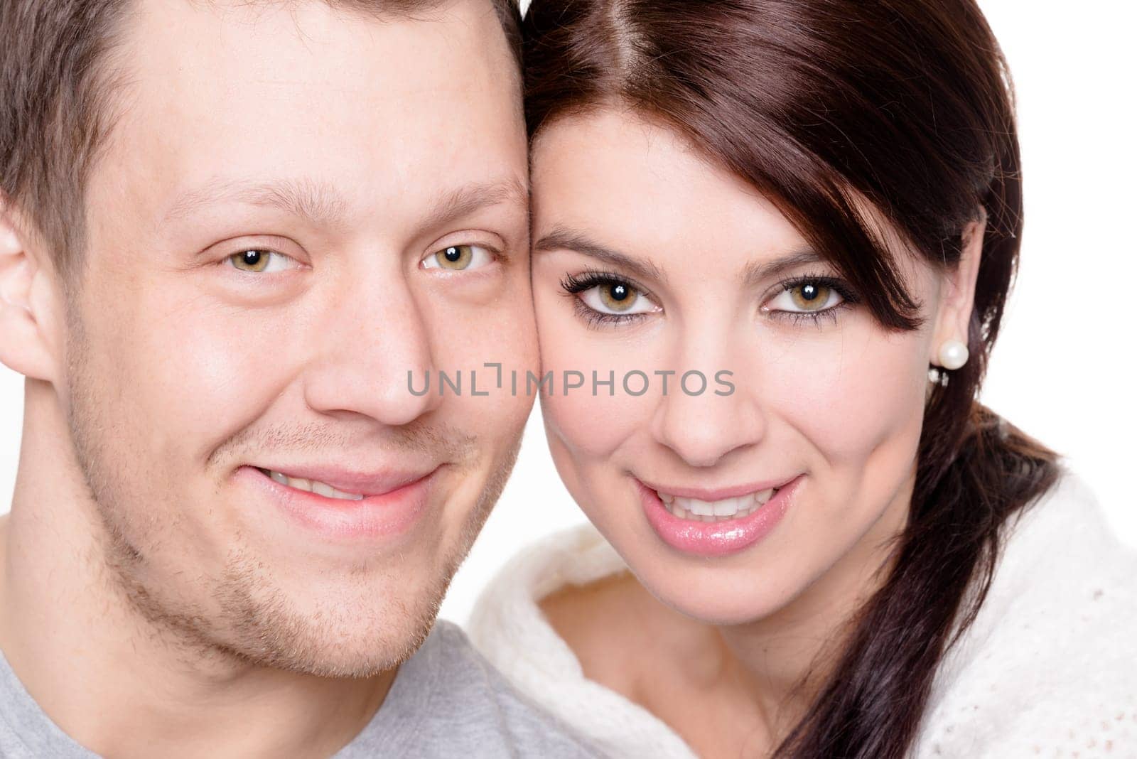 Studio shot of a young couple against a white background