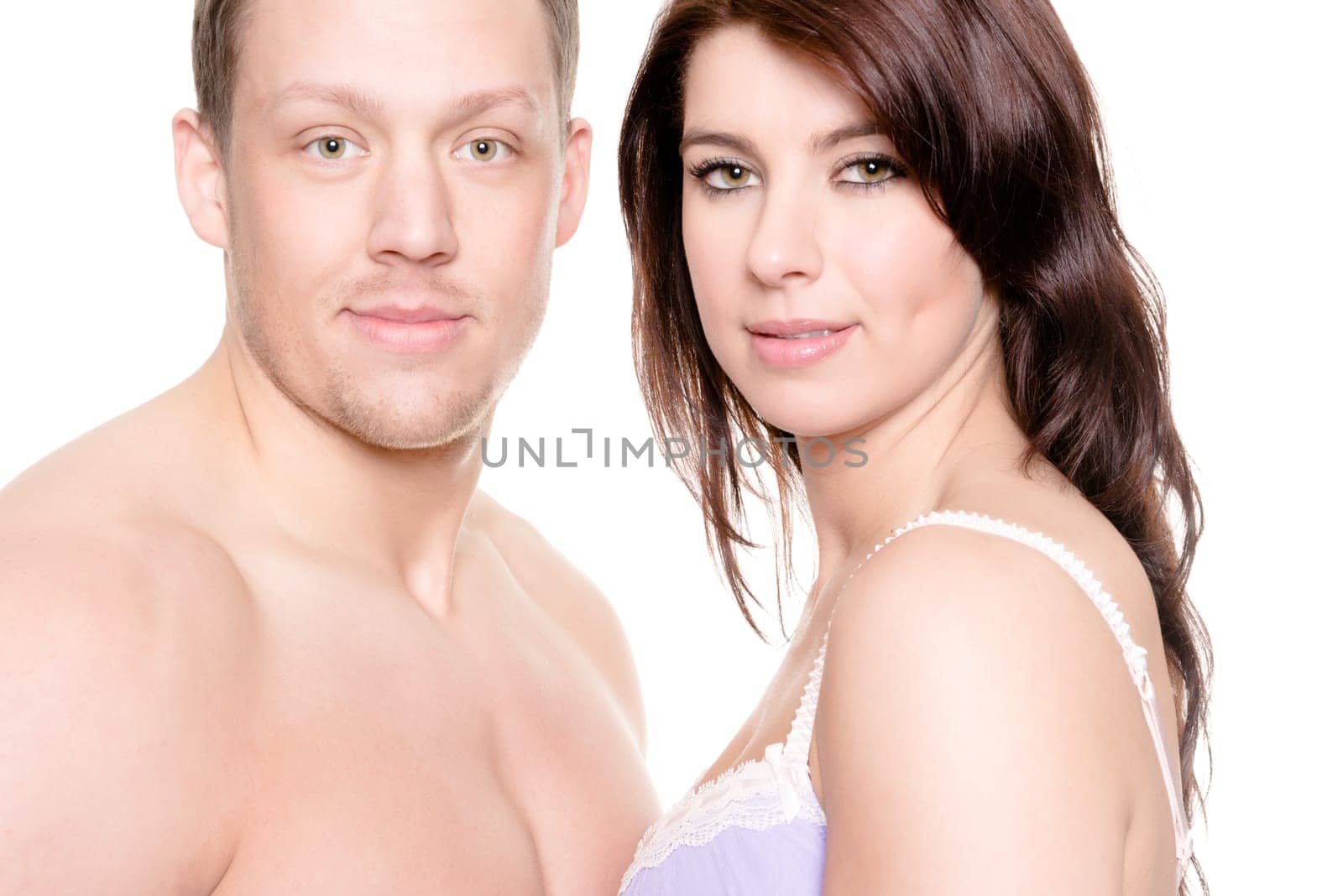 Studio shot of a young couple against a white background
