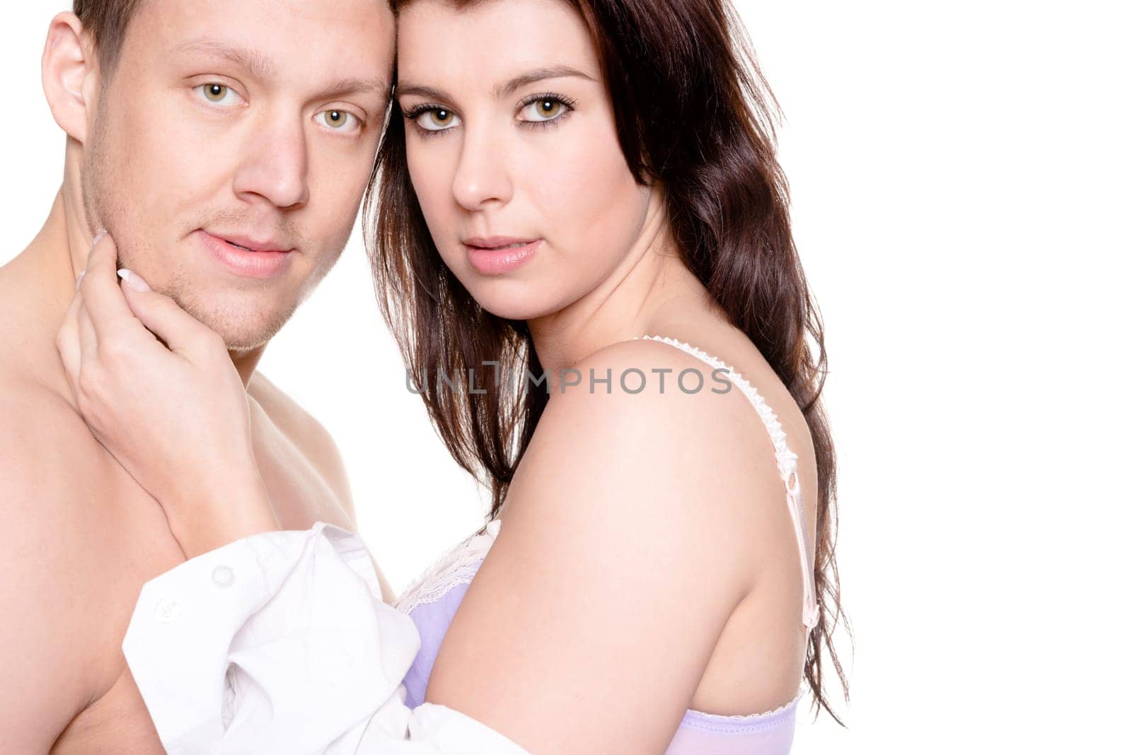 Studio shot of a young couple against a white background