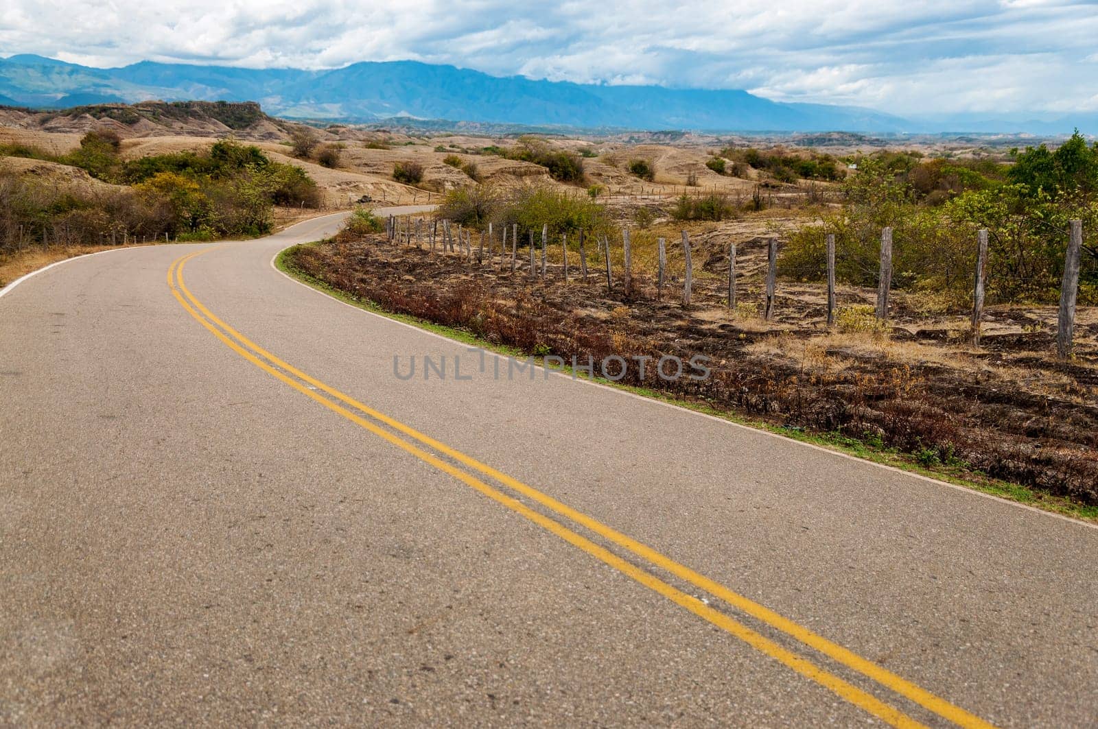 Long winding road through a dry arid landscape