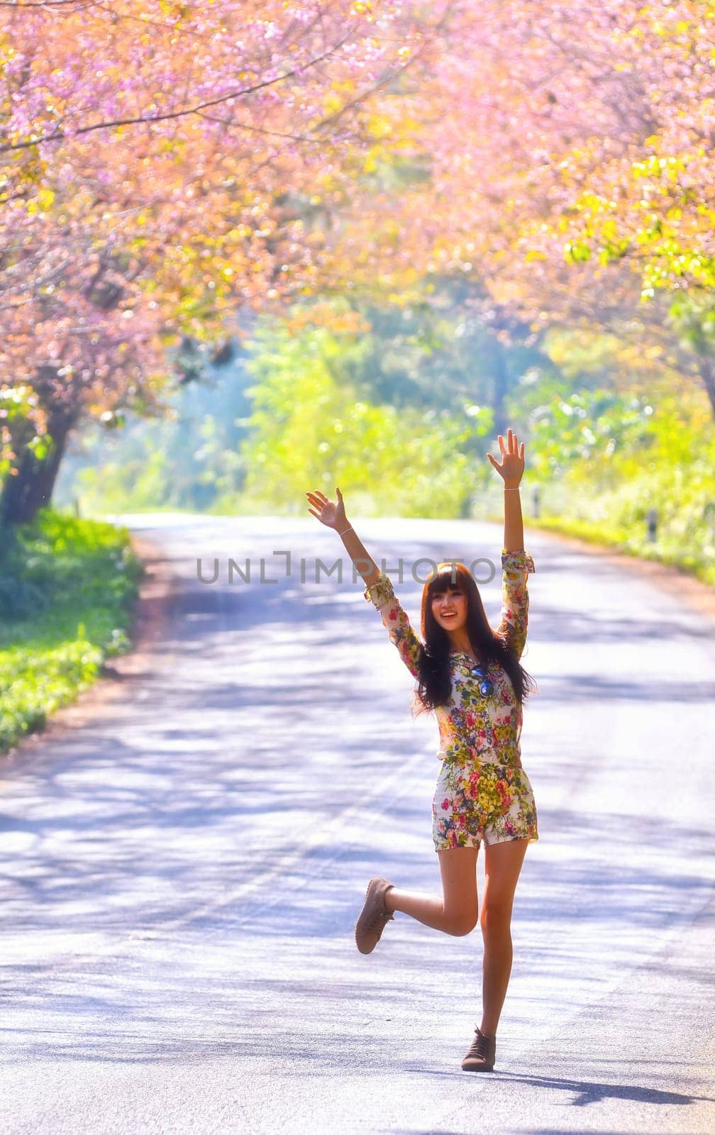 Happy woman on the road