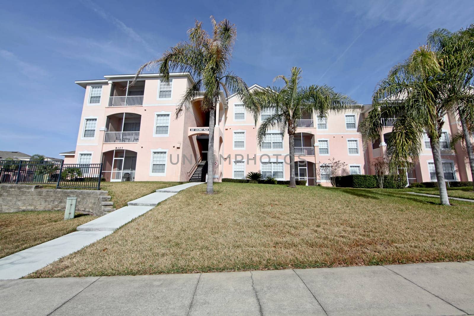 A condo unit in Florida with Palm Trees