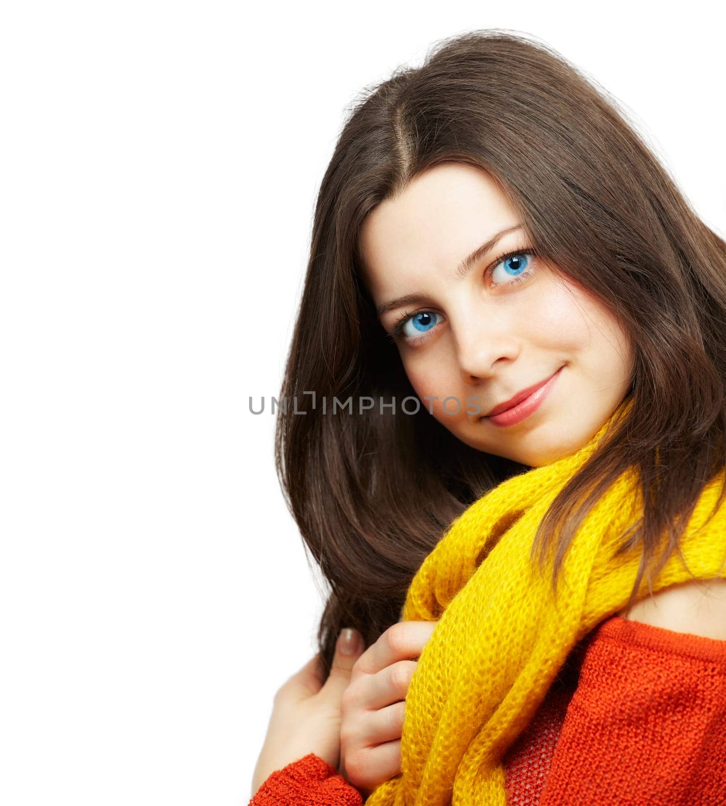 Portrait of a beautiful young woman with yellow scarf over white background.