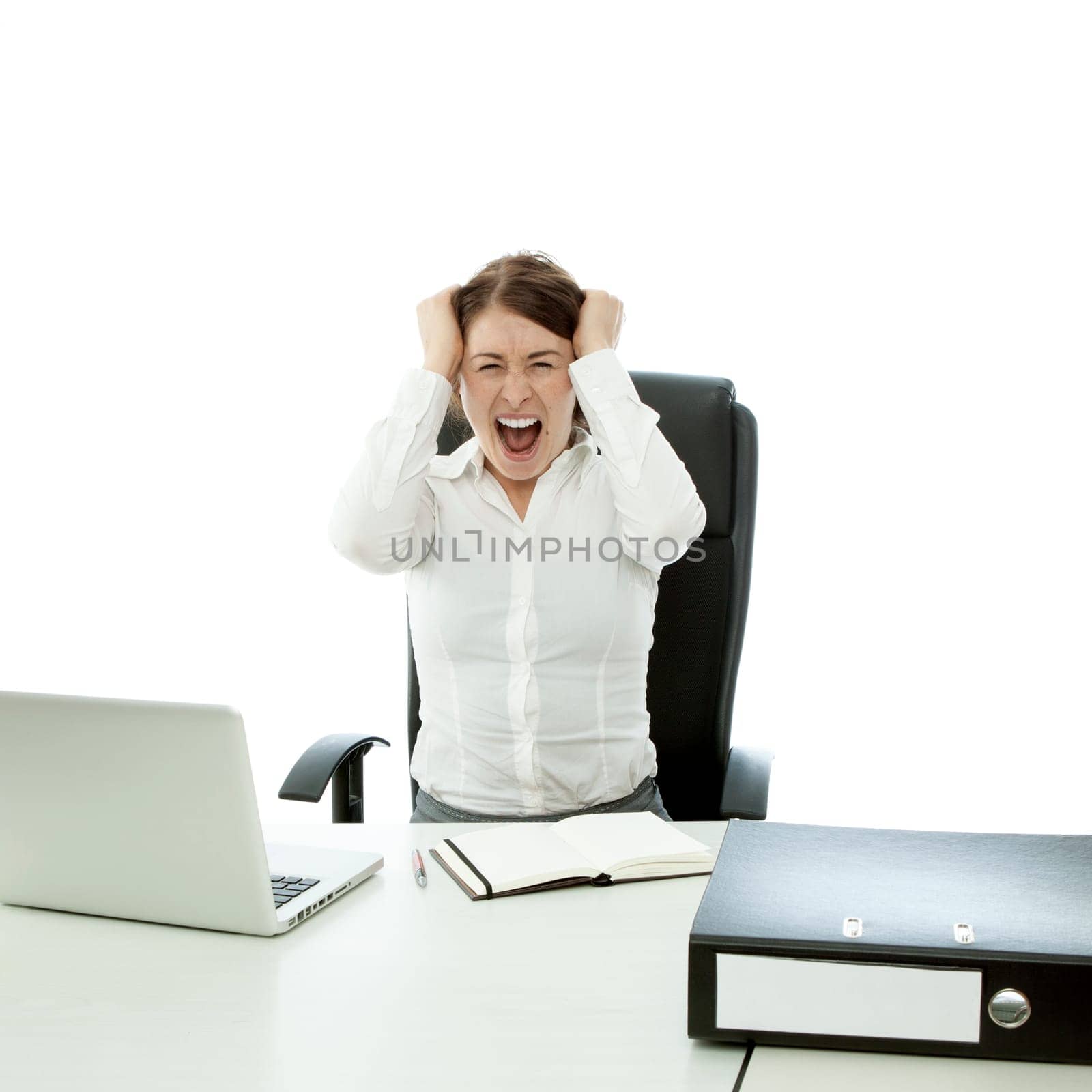 young brunette business woman is frustated hands on head and hair