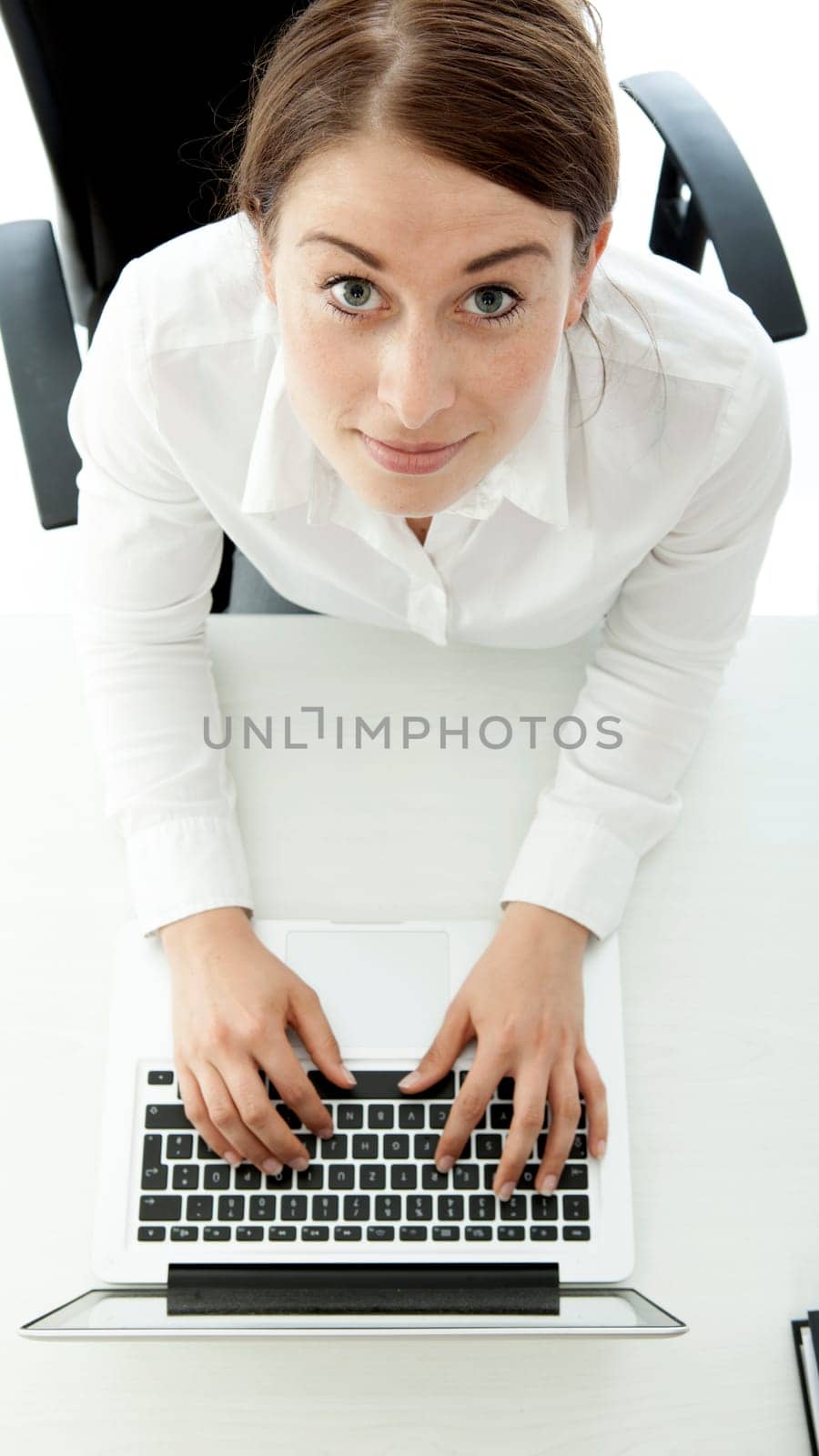 young business woman smiling above