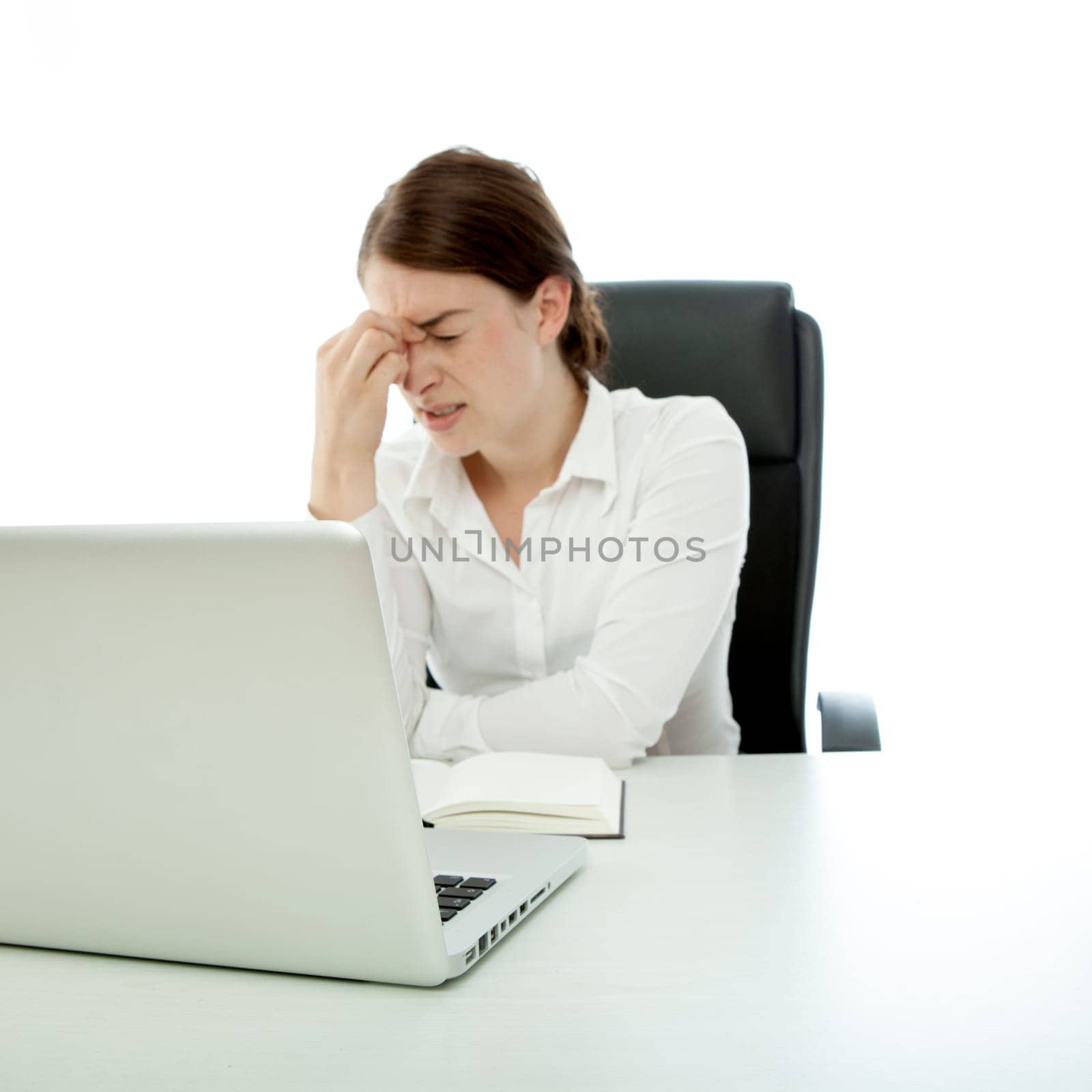 young brunette business woman headache touch head finger