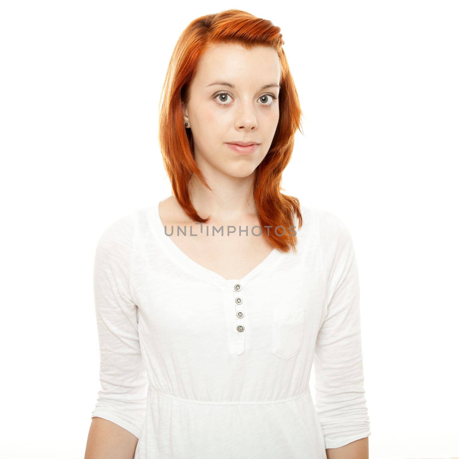 young beautiful red haired girl in front of white background