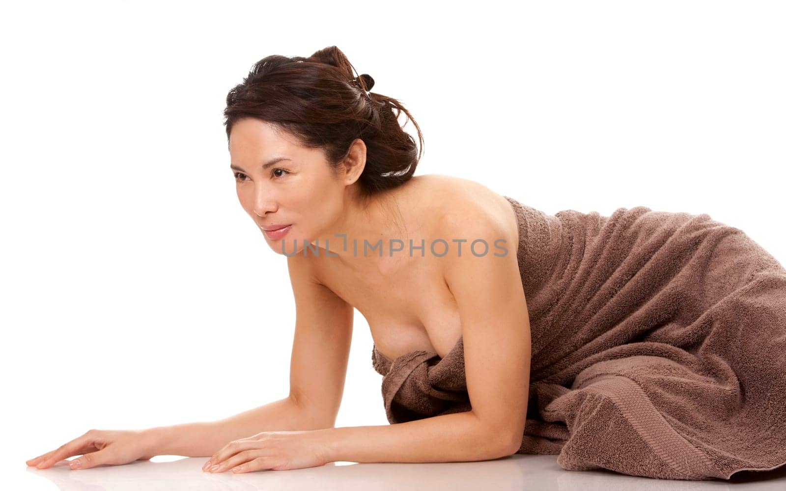 beautiful asian brunette nude on white isolated background