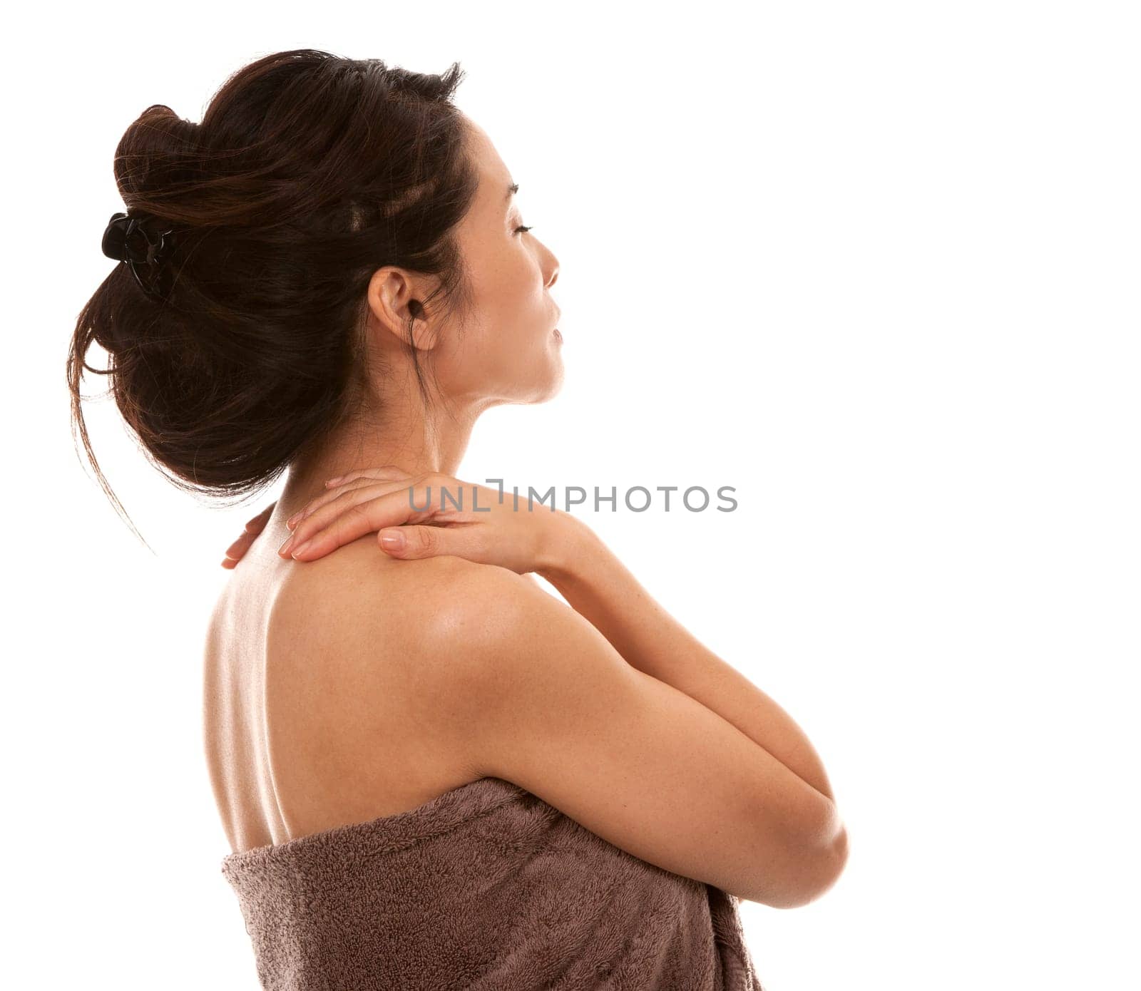 beautiful asian brunette nude on white isolated background