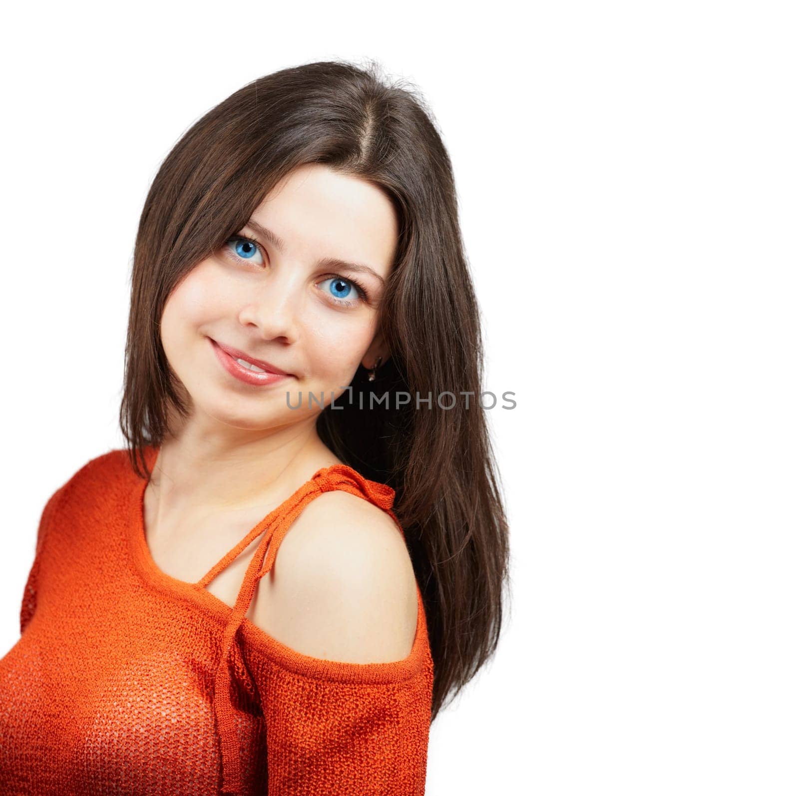 Portrait of a beautiful young woman with red top over white background.