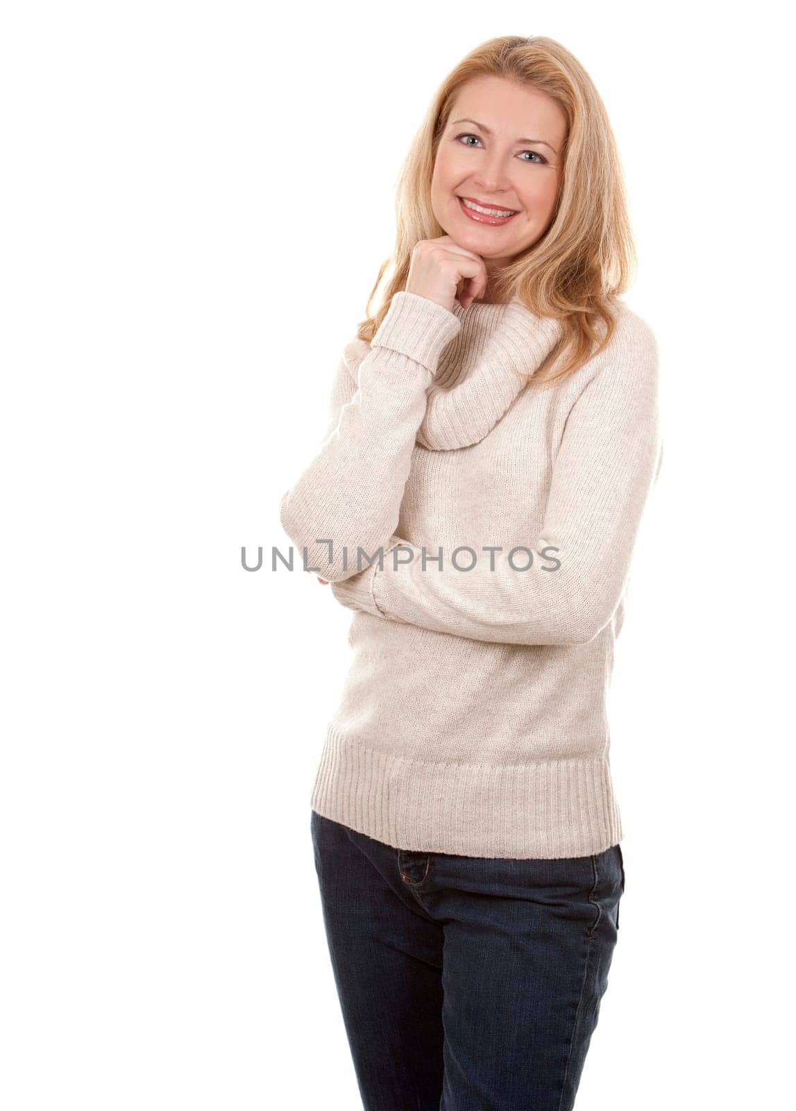 pretty blond woman wearing beige sweather on white background