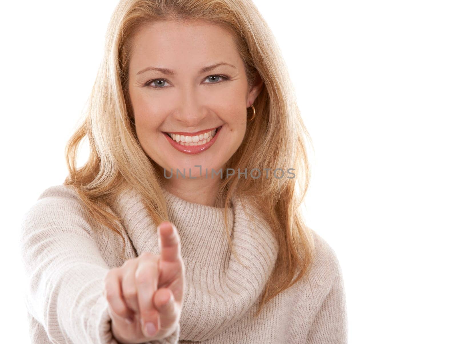 pretty blond woman wearing beige sweather on white background