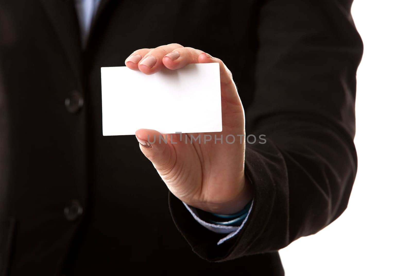 business woman in her 40s holding business card