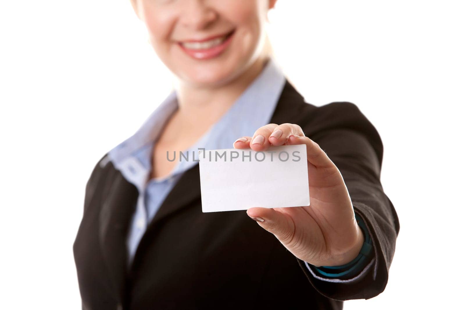 business woman in her 40s holding business card