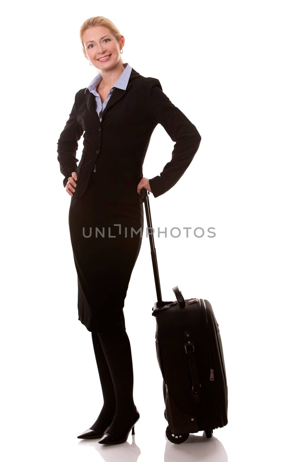 business woman in her 40s with suitcase on white background