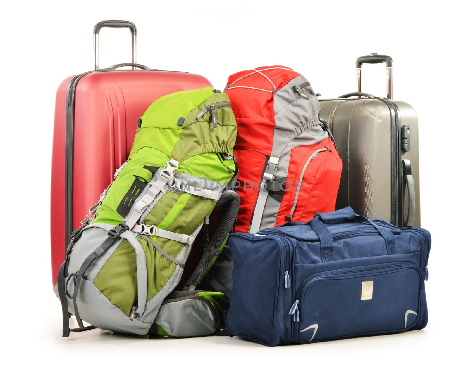 Luggage consisting of large suitcases rucksacks and travel bag isolated on white