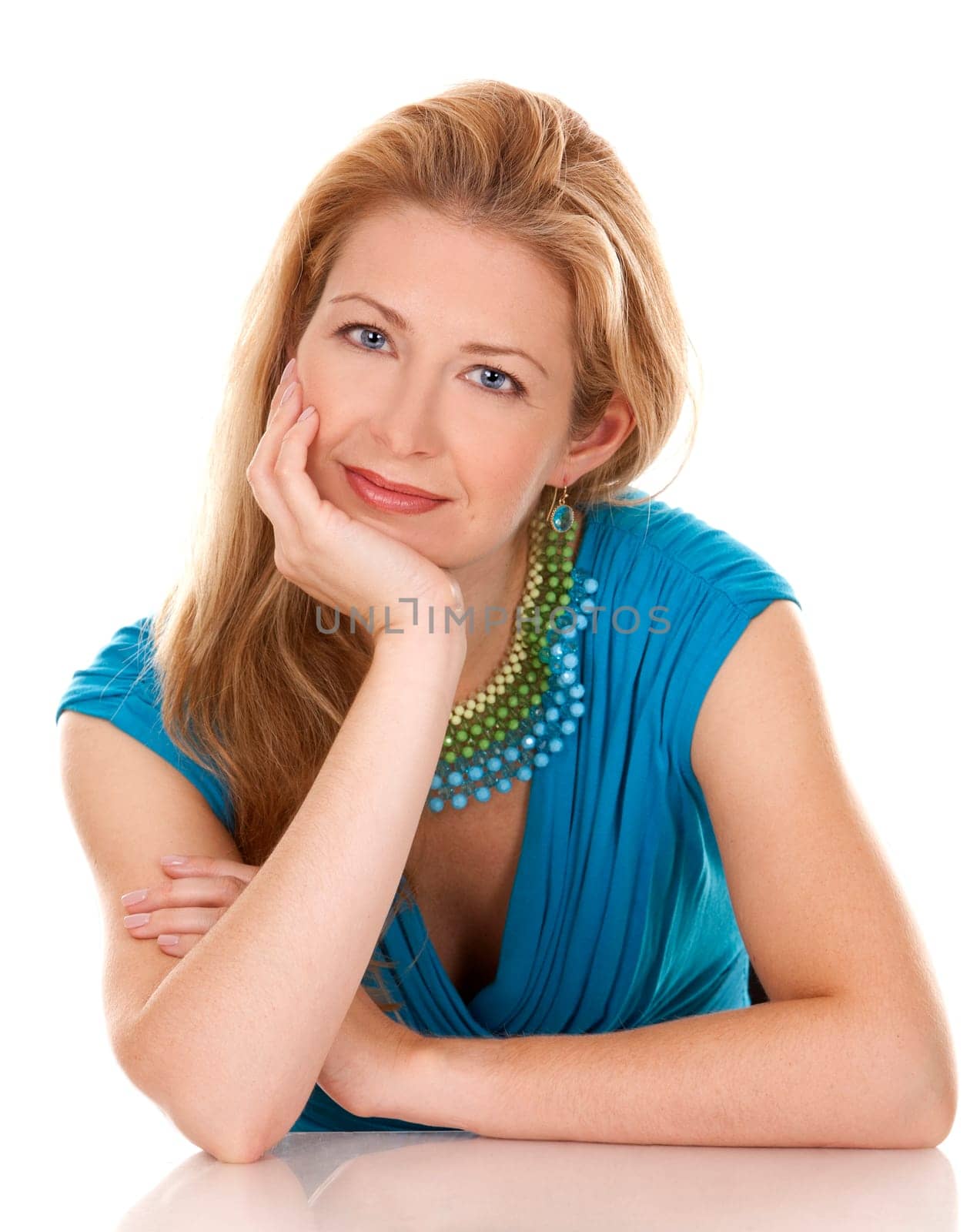 classy blond woman in her 40s wearing turquois dress