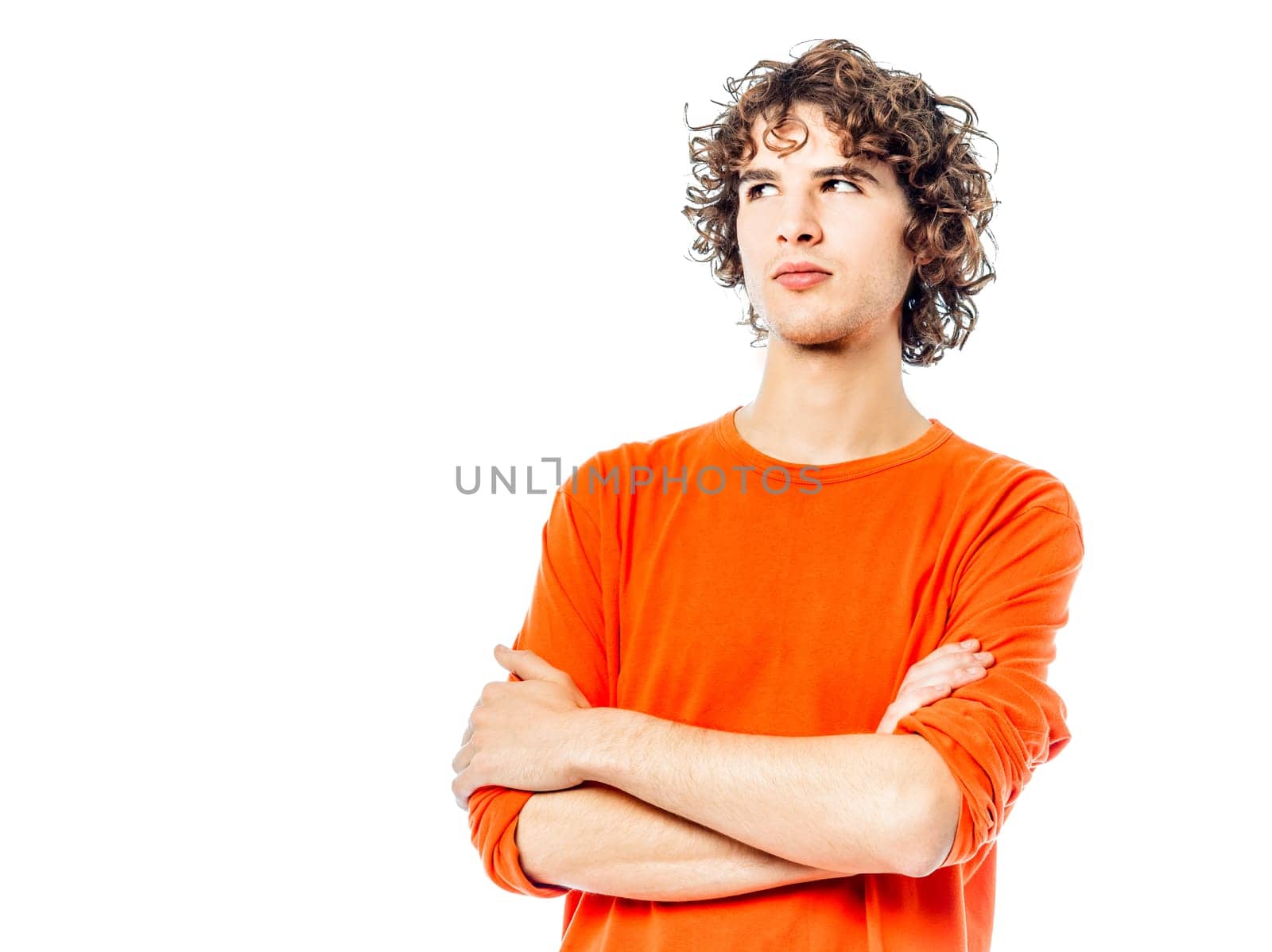 one young man suspicious  caucasian looking up portrait  in studio white background