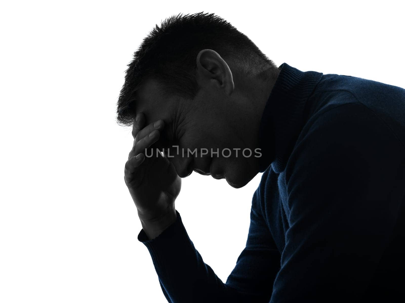 one caucasian man headache pain portrait in silhouette studio isolated on white background