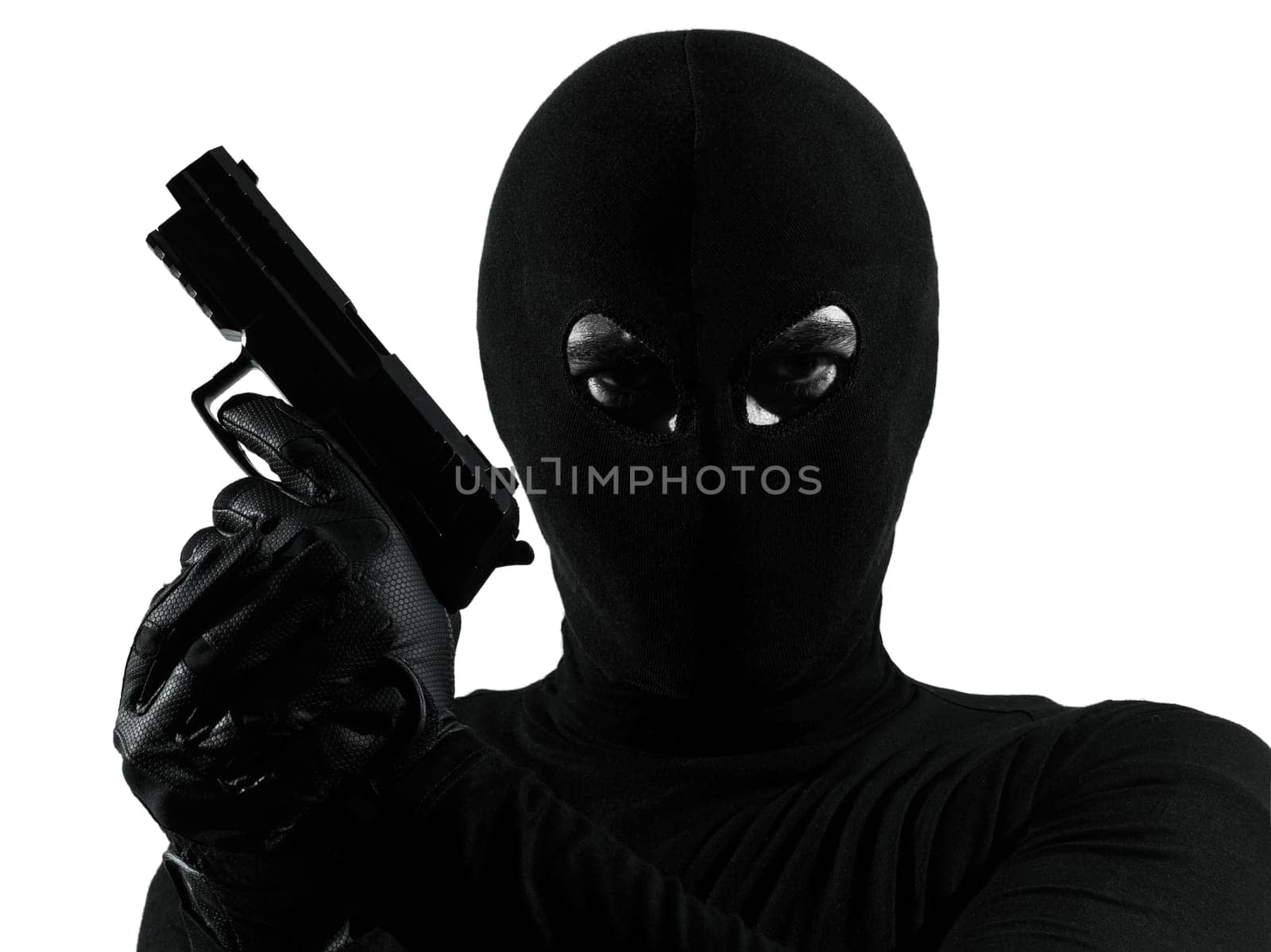 thief criminal terrorist holding gun portrait in silhouette studio isolated on white background
