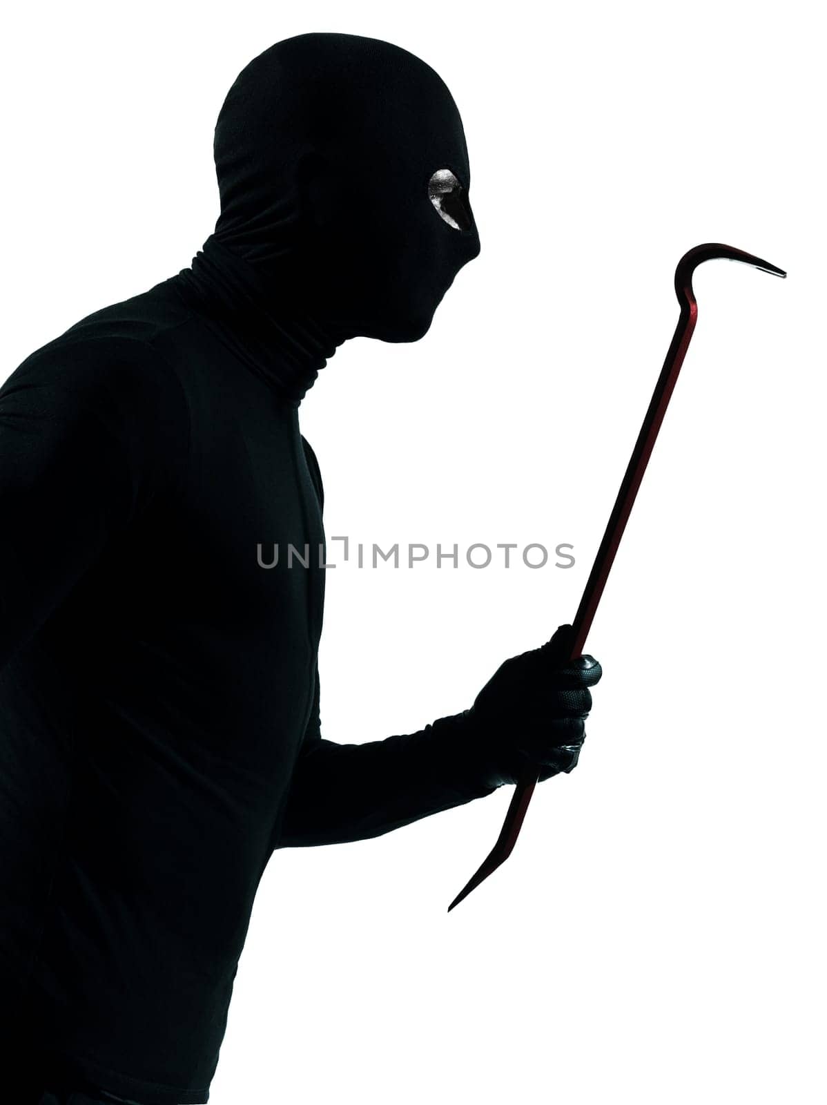 thief criminal holding crowbar portait in silhouette studio isolated on white background