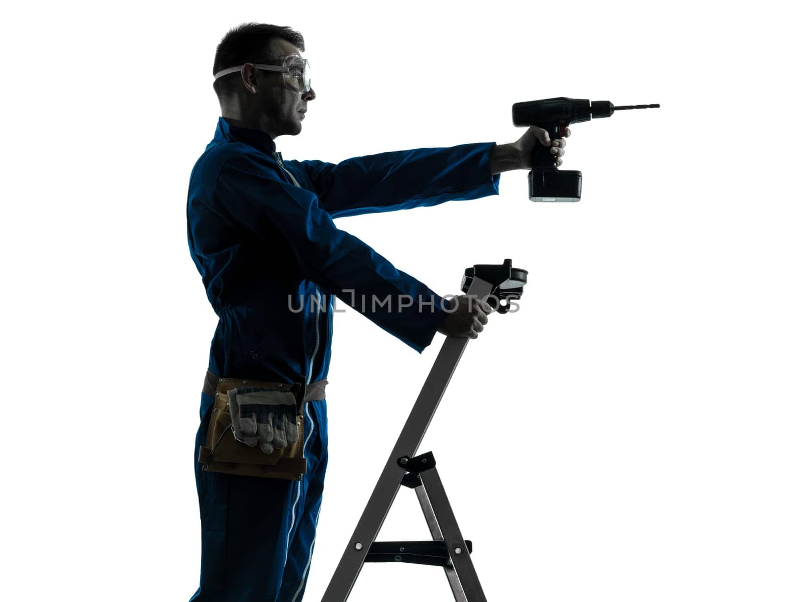 one caucasian man construction worker holding drill silhouette in studio on white background