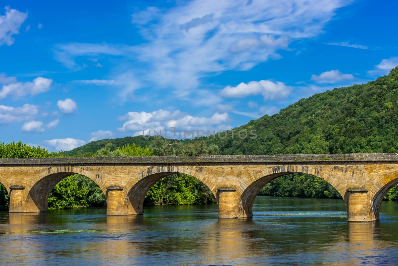 medevial bridge over the dordogne river perigord france
