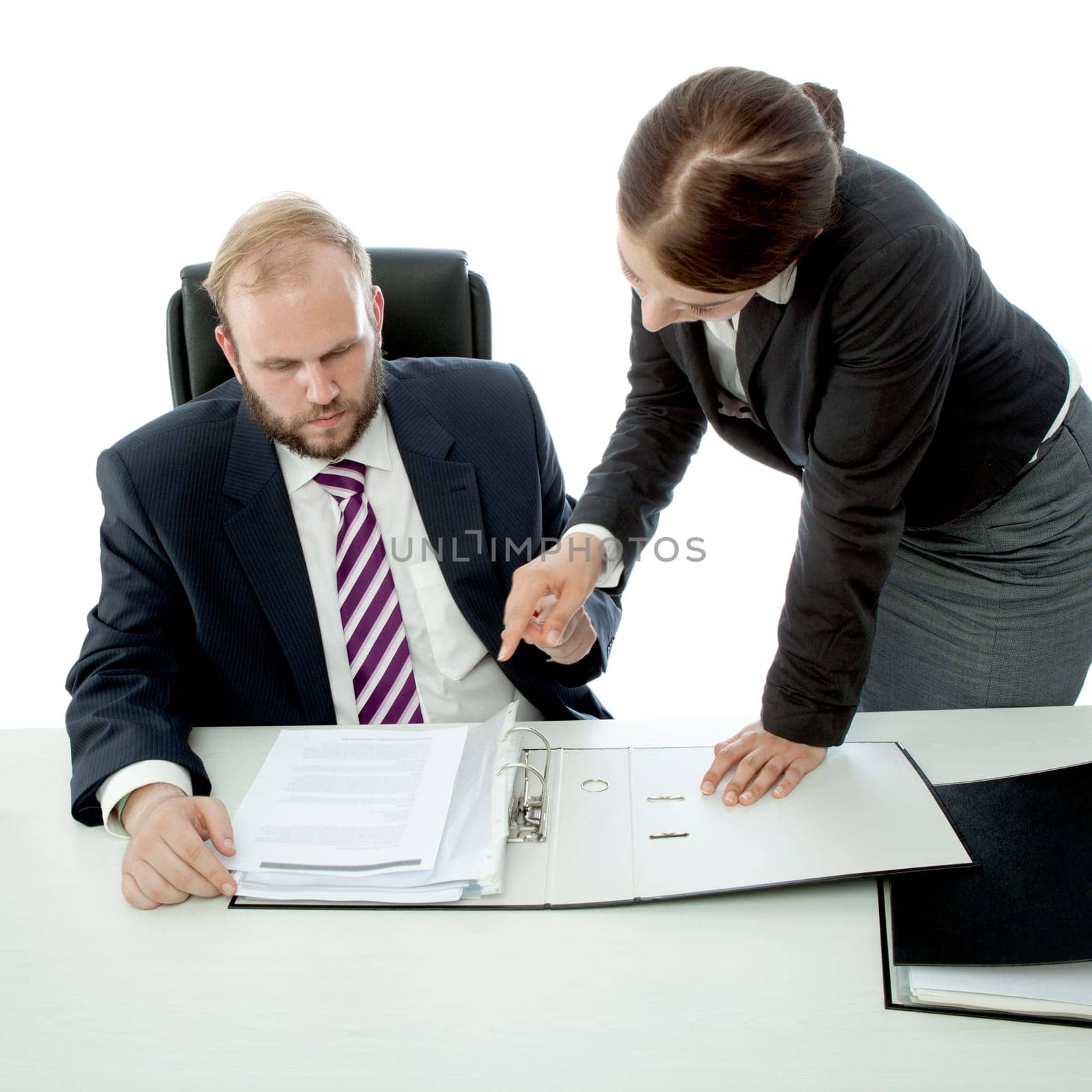 beard business man brunette woman at desk show documents