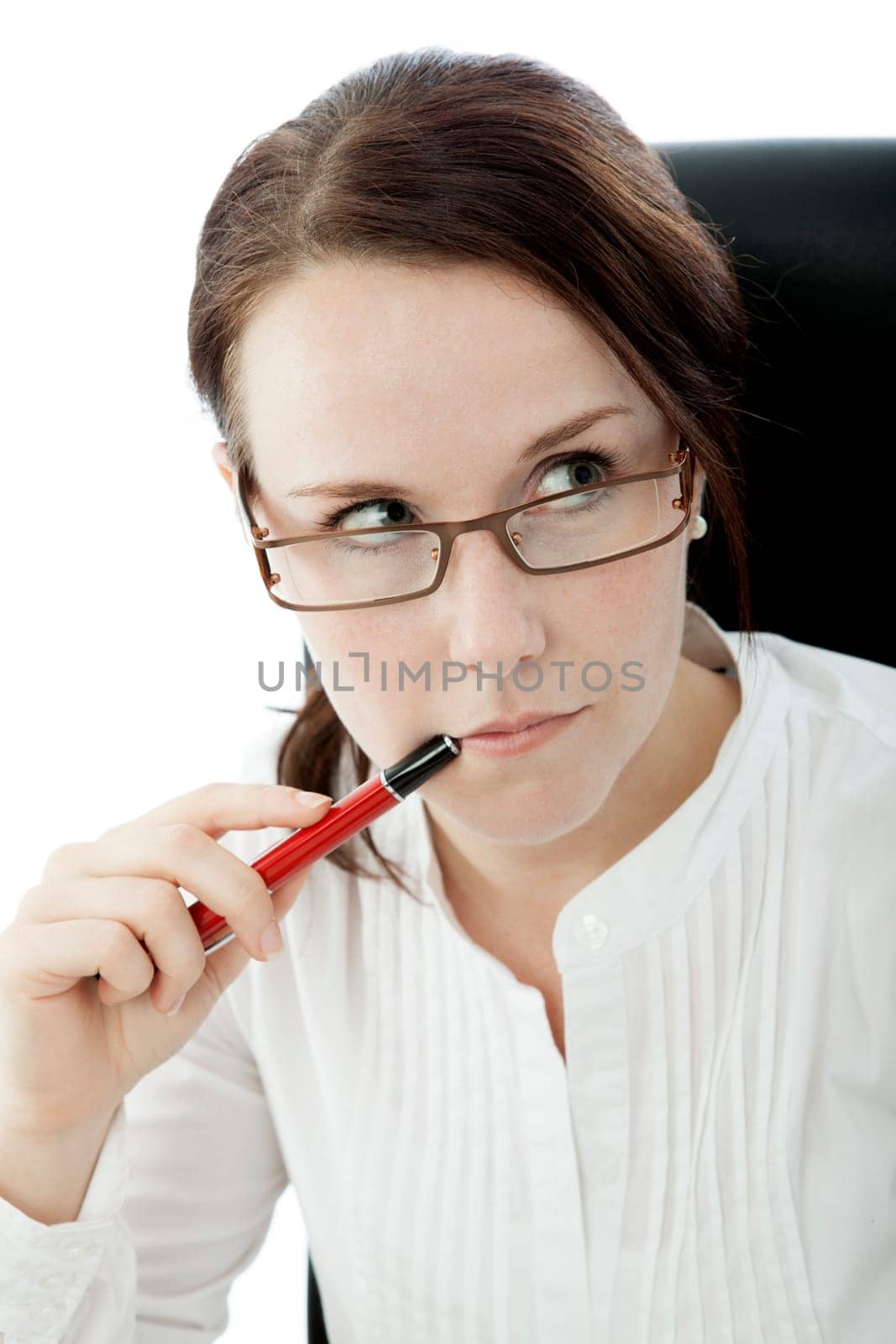 young brunette business woman with glasses and pen thinking