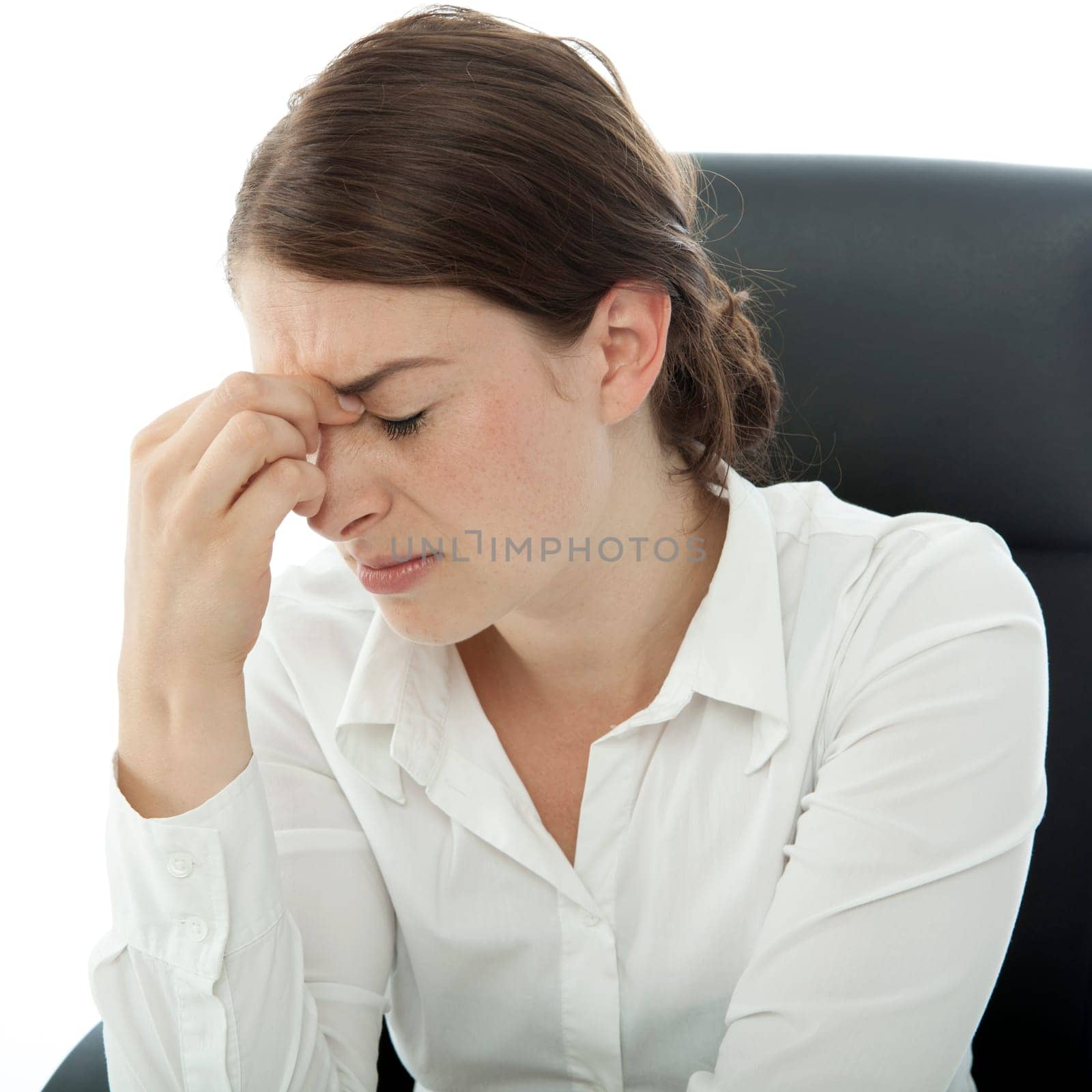 young brunette business woman headache touch head with finger