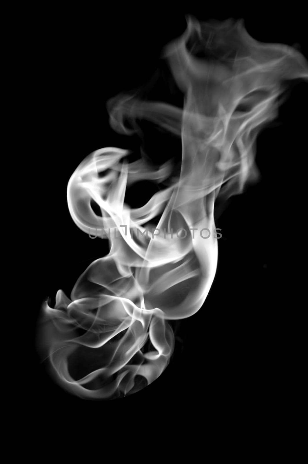 white fire with a black background, abstract background.