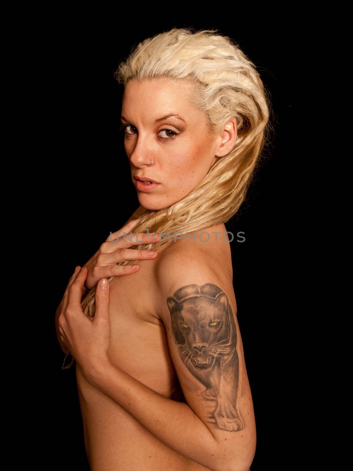 Beautiful Urban Girl with blond dreadlocks. Black panther tattoo