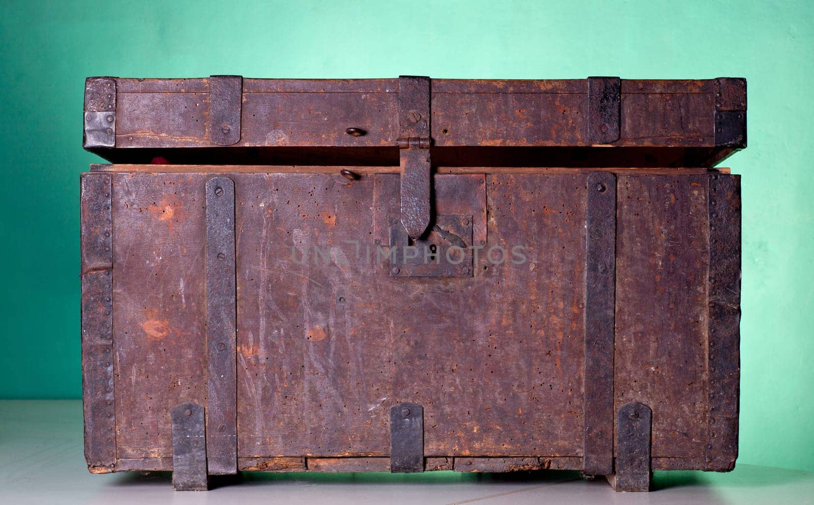 Antique wooden trunk on a table