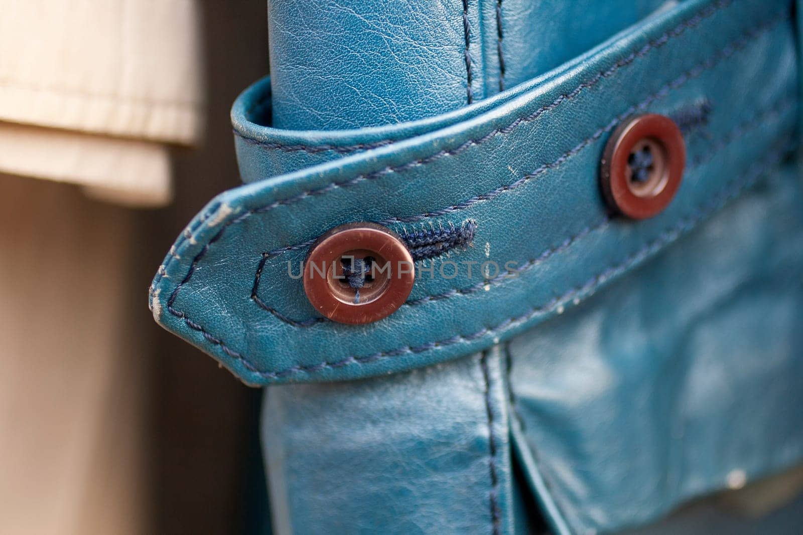Photo of leather cuff with buttons