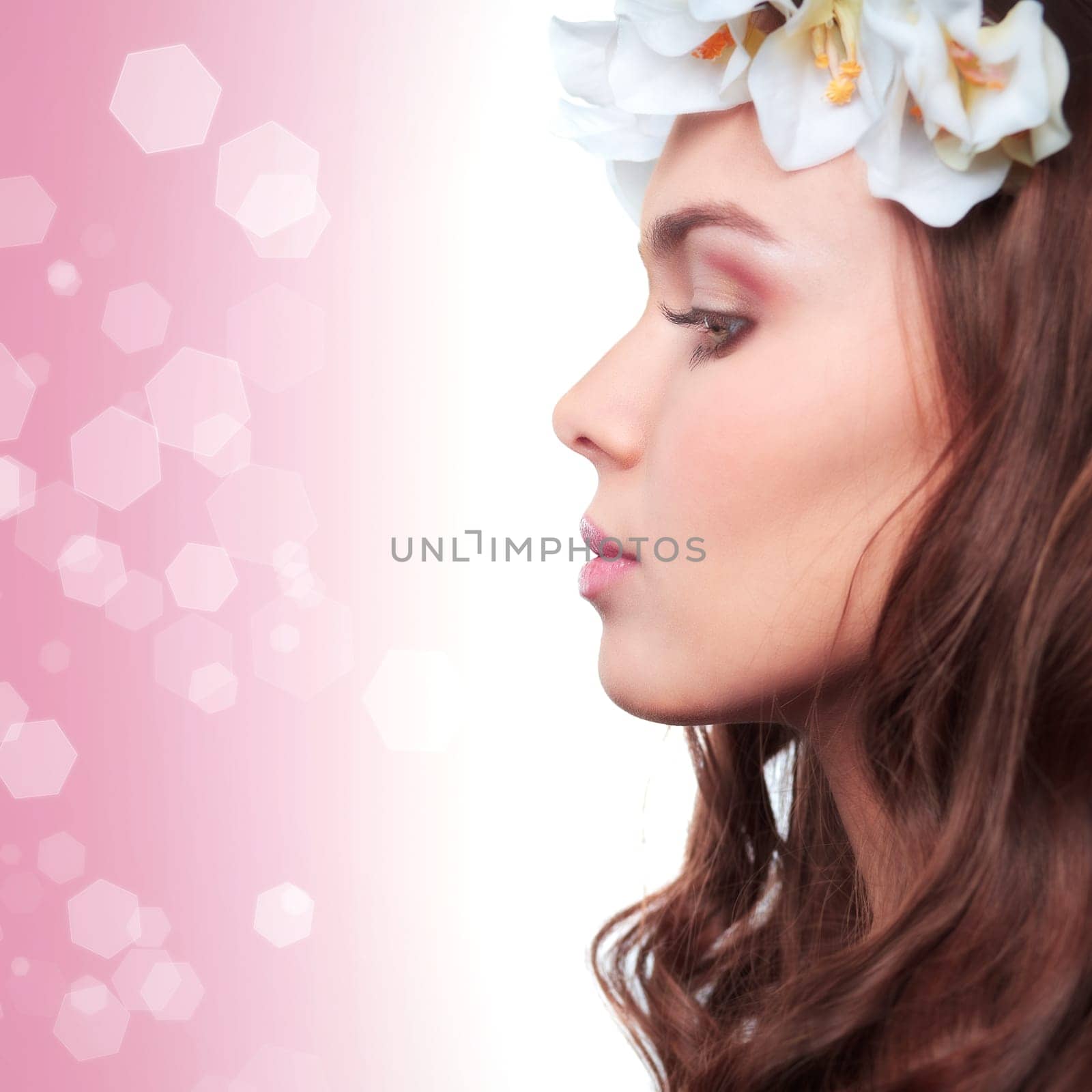 Creative portrait of a girl with a spring hairstyle in profile