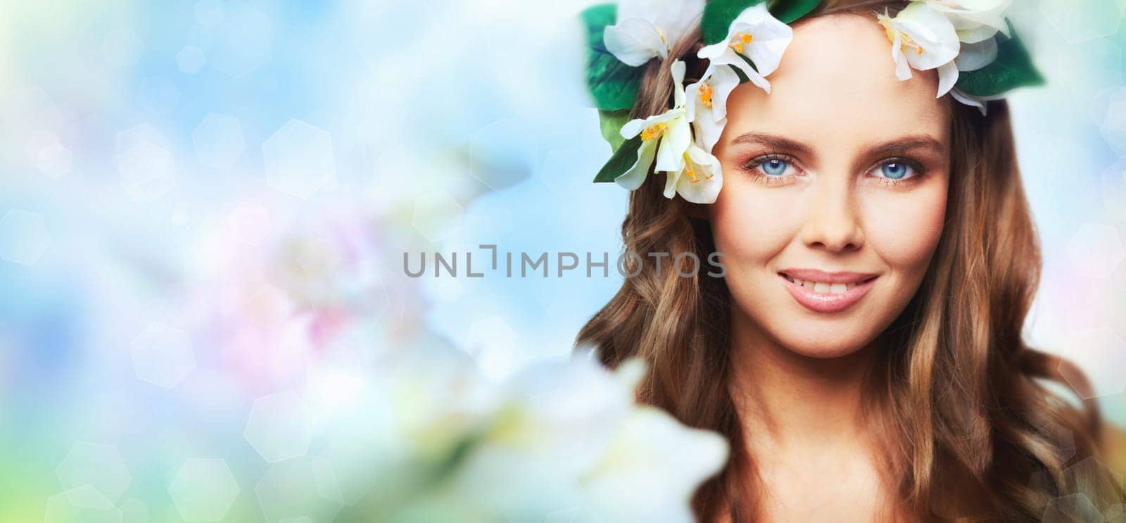 Creative portrait of a gorgeous young woman expressing the spirit of spring