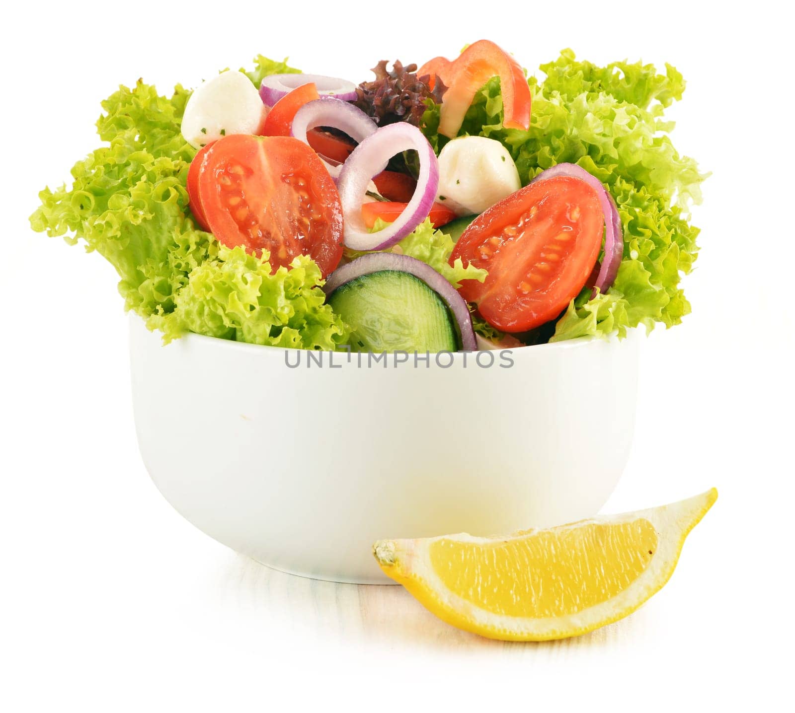 Vegetable salad bowl isolated on white background