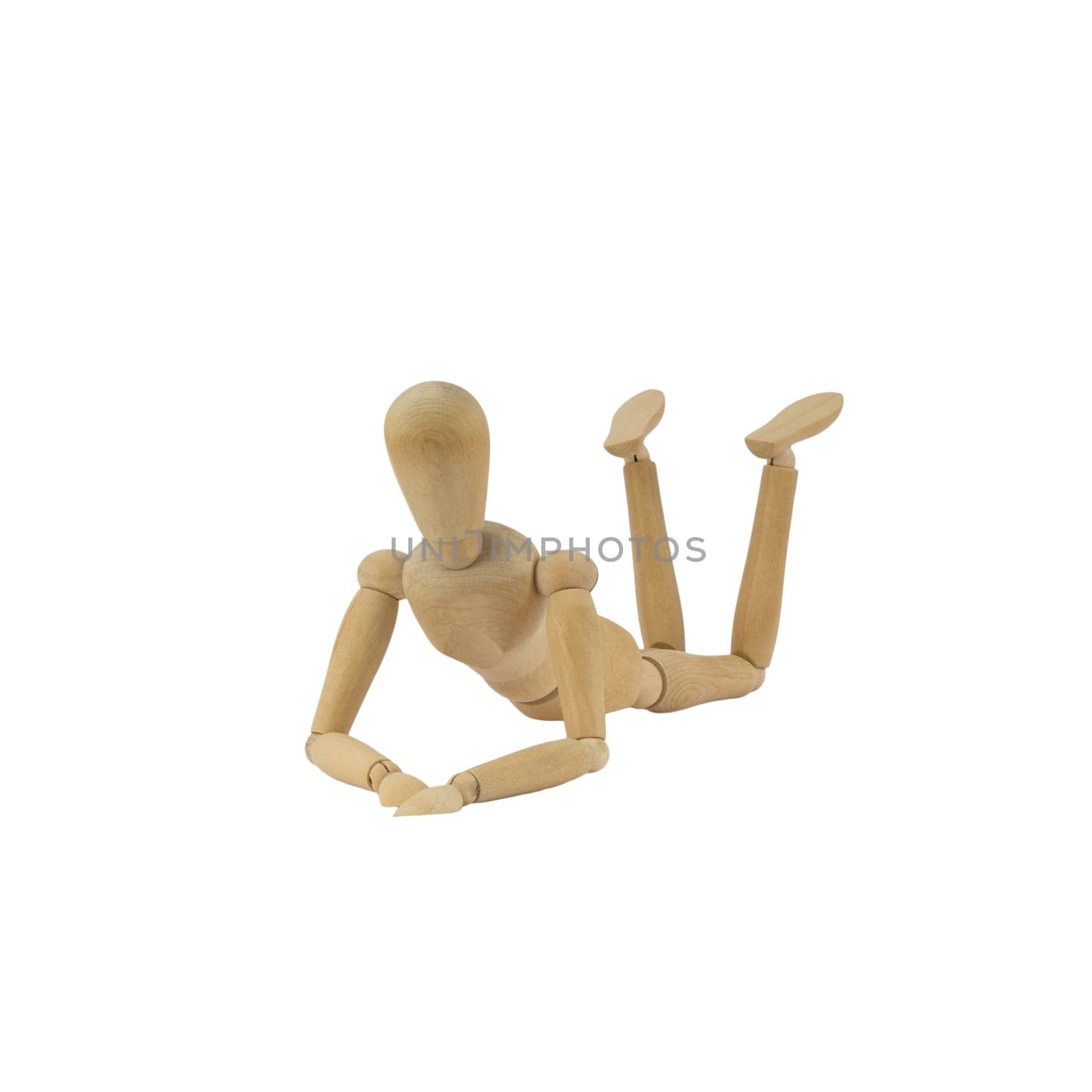 Wooden female figure is lying on her belly