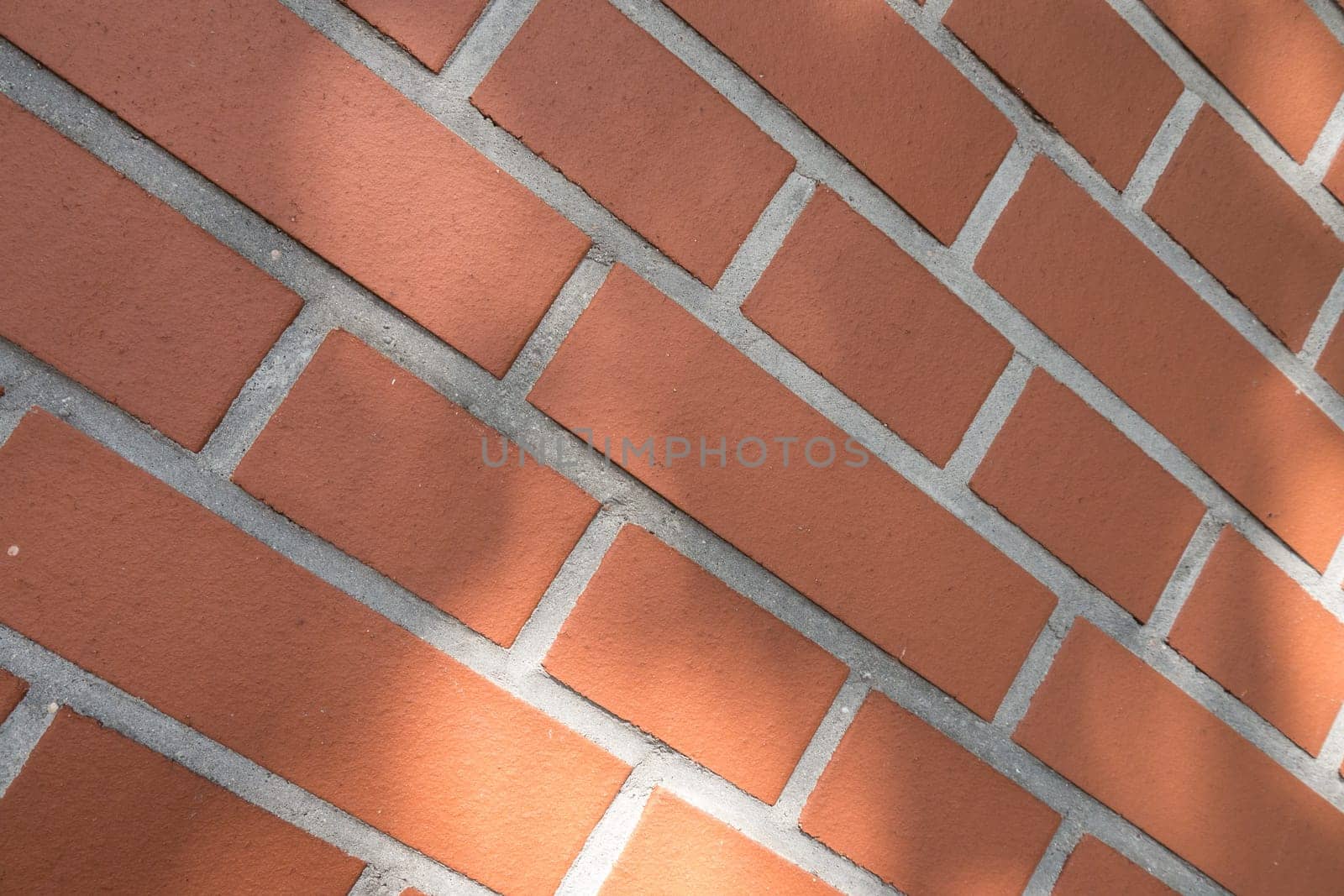 A brickwall texture with lightreflections from sun