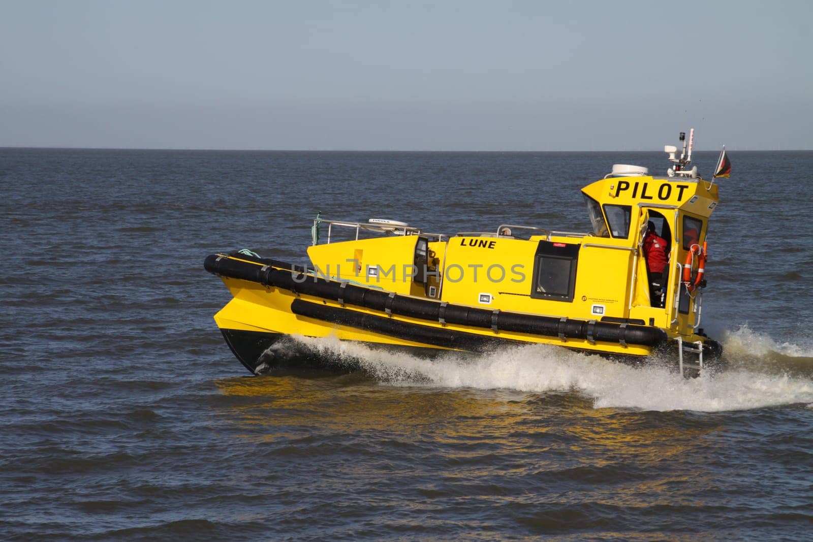 Yellow pilot boat on the North Sea